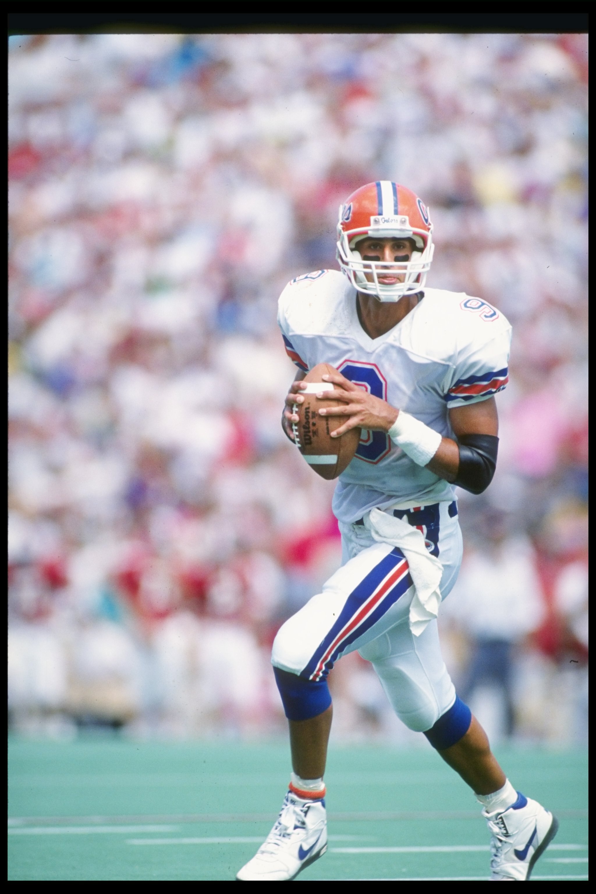 15 Sep 1990:  Quarterback Shane Matthews of the Florida Gators rolls out of the pocket during a game against the Alabama Crimson Tide at Bryant-Denny Stadium in Tuscaloosa, Alabama.  Florida won the game 17-13. Mandatory Credit: Rick Stewart  /Allsport
