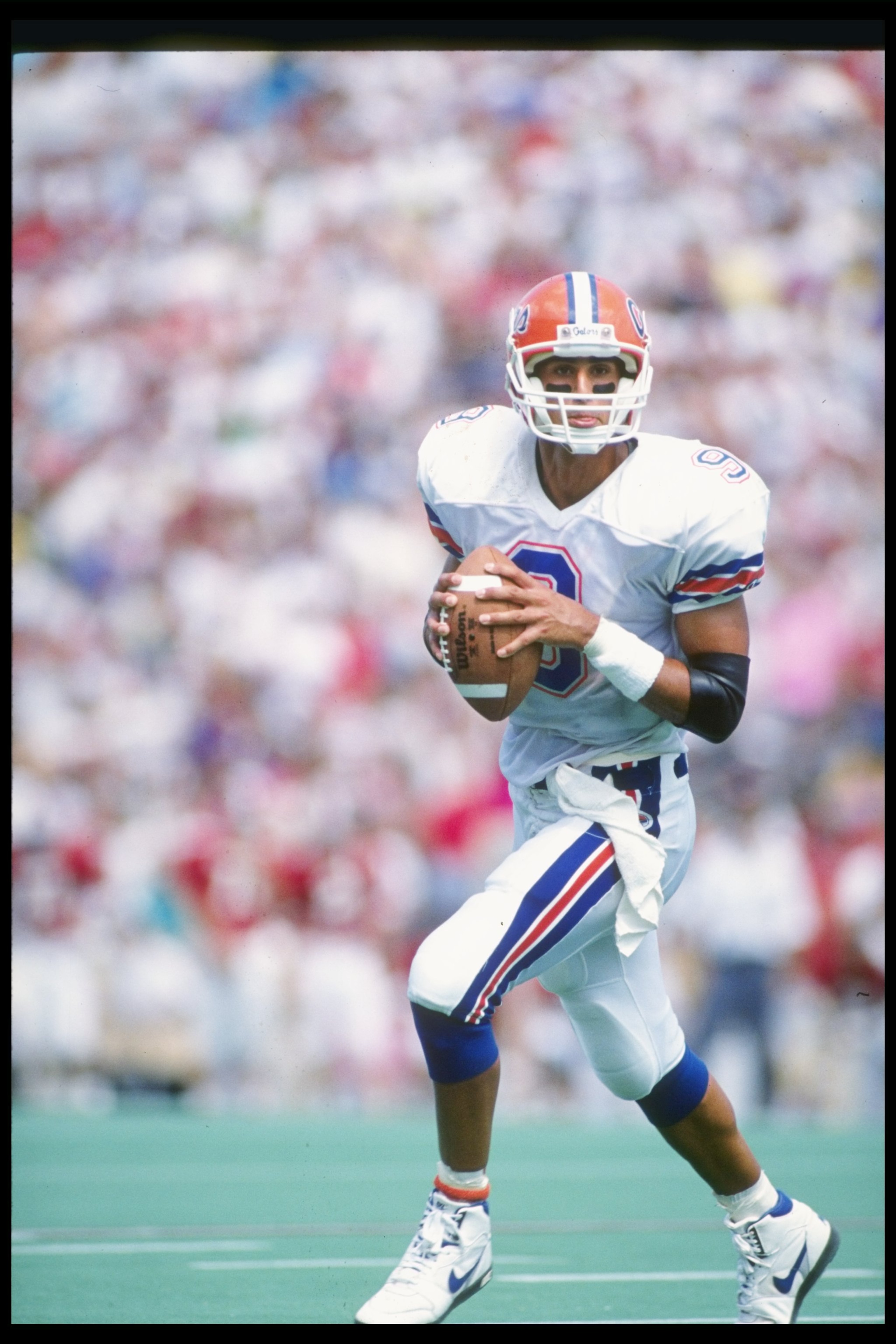 15 Sep 1990:  Quarterback Shane Matthews of the Florida Gators rolls out of the pocket during a game against the Alabama Crimson Tide at Bryant-Denny Stadium in Tuscaloosa, Alabama.  Florida won the game 17-13. Mandatory Credit: Rick Stewart  /Allsport