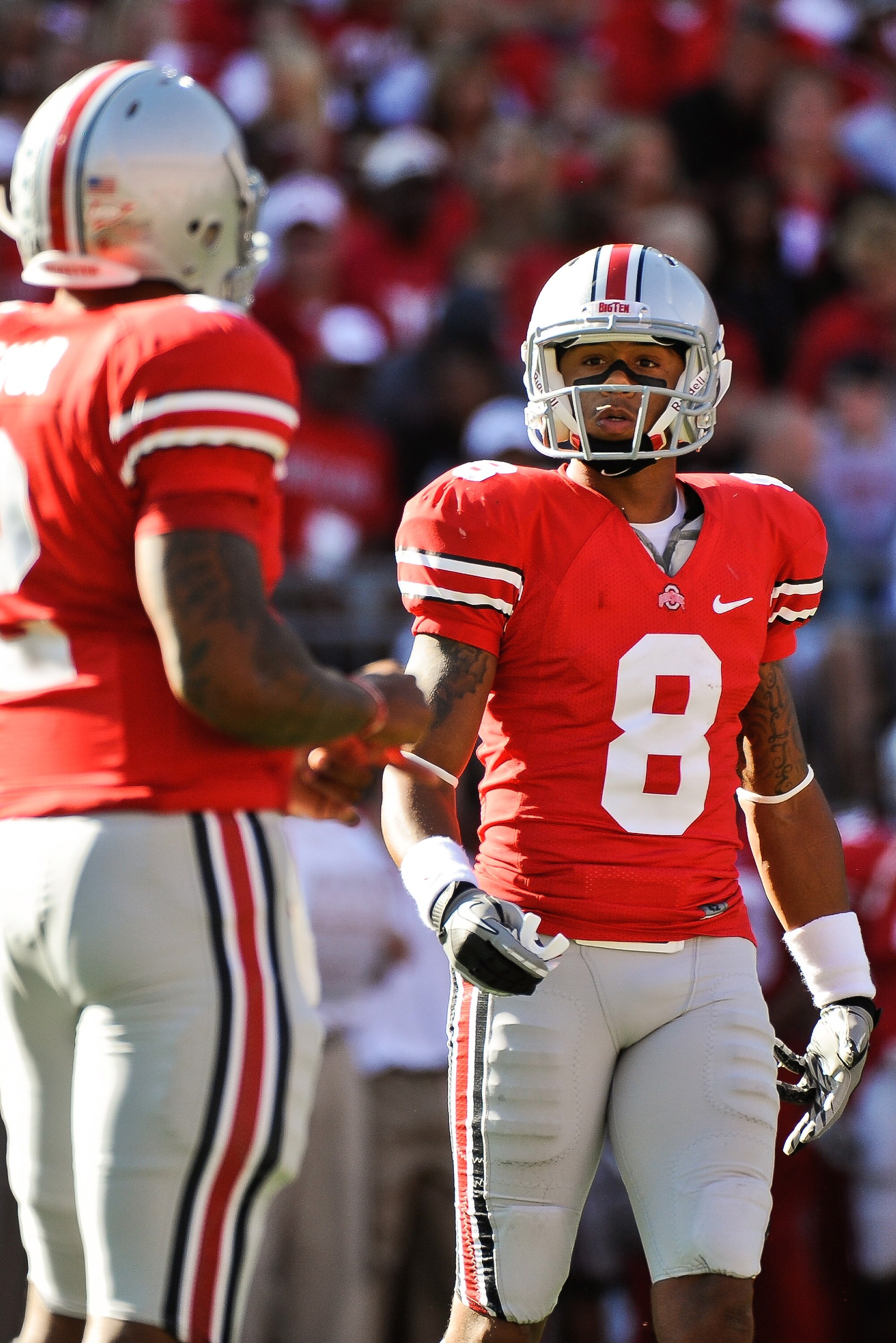 COLUMBUS, OH - SEPTEMBER 25:  DeVier Posey #8 of the Ohio State Buckeyes has a discussion with quarterback Terrelle Pryor #2 of the Ohio State Buckeyes during a game against the Eastern Michigan Eagles at Ohio Stadium on September 25, 2010 in Columbus, Oh