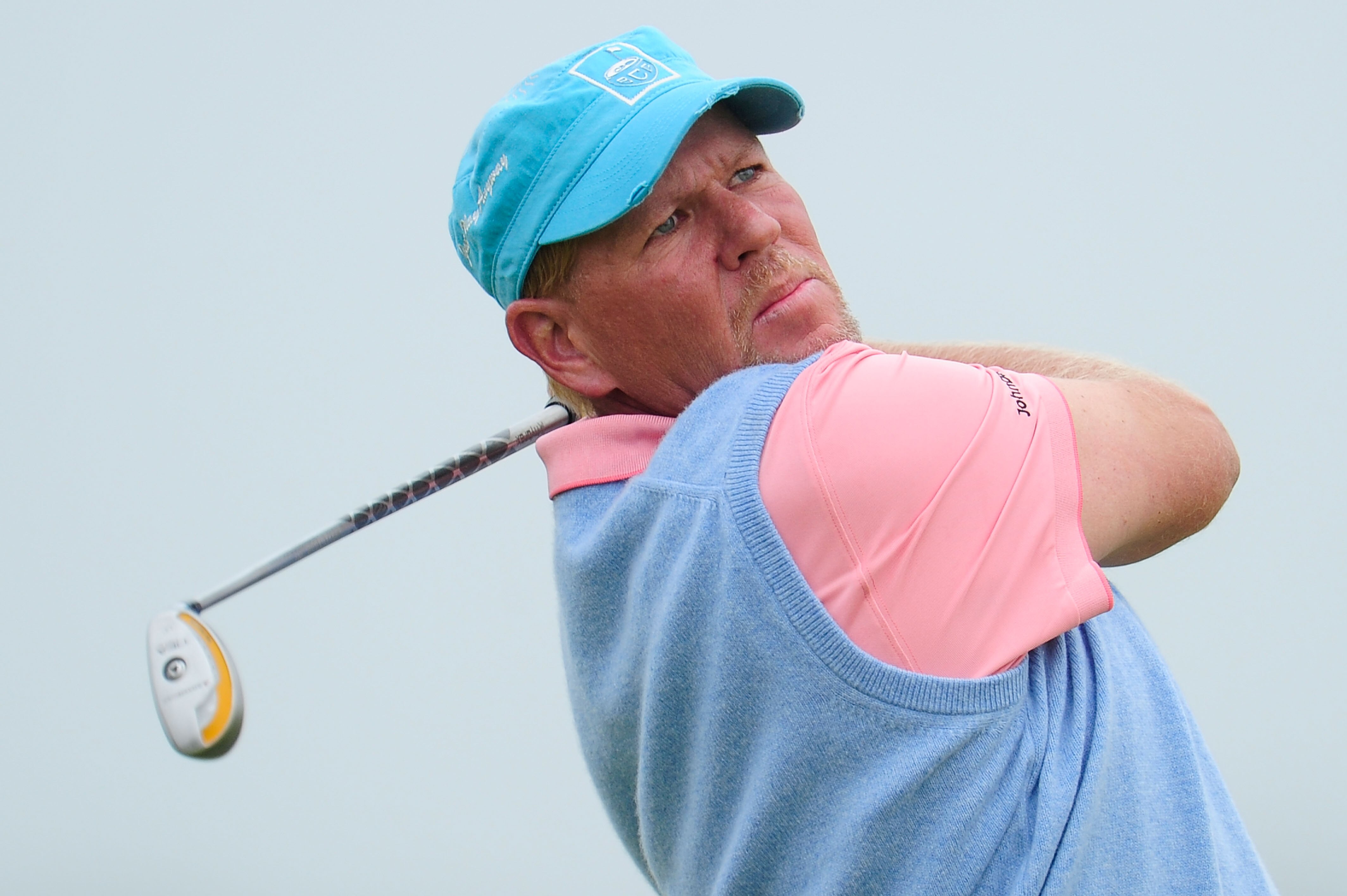 ST ANDREWS, SCOTLAND - JULY 15:  John Daly of the USA watches his tee shot on the seventh hole during the first round of the 139th Open Championship on the Old Course, St Andrews on July 15, 2010 in St Andrews, Scotland.  (Photo by Stuart Franklin/Getty I