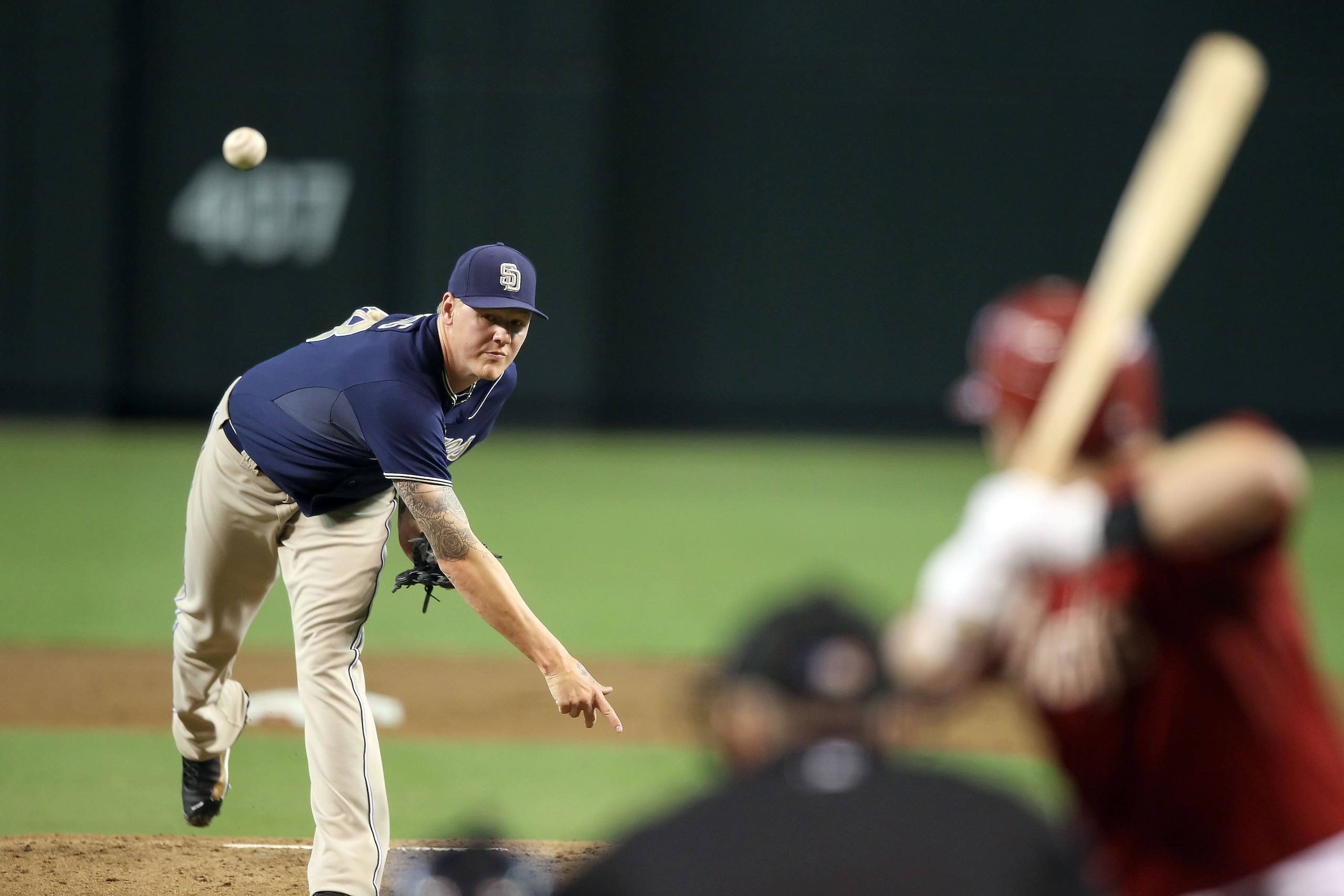 PHOENIX - SEPTEMBER 01:  Starting pitcher Mat Latos #38 of the San Diego Padres pitches against the Arizona Diamondbacks during the Major League Baseball game at Chase Field on September 1, 2010 in Phoenix, Arizona. The Diamondbacks defeated the Padres 5-