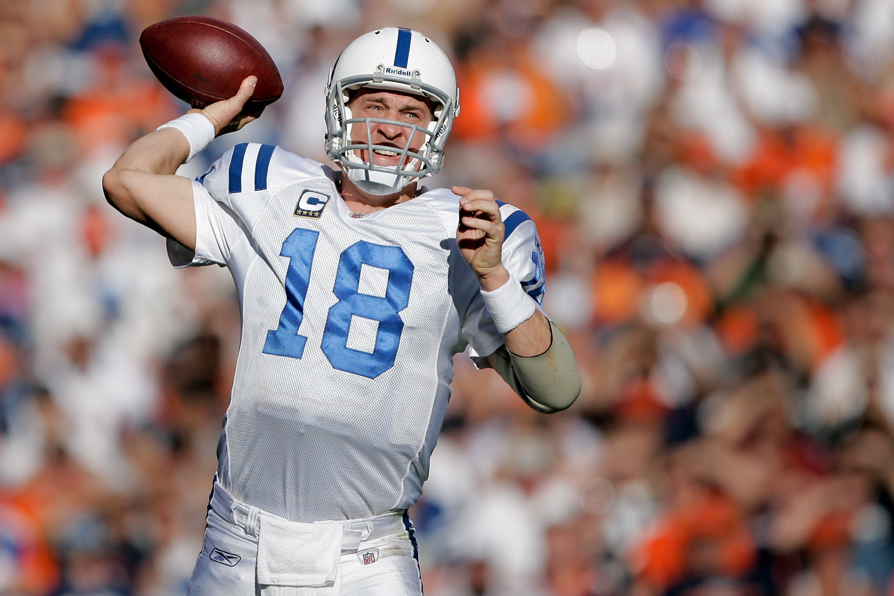 DENVER - SEPTEMBER 26:  Quarterback Peyton Manning #18 of the Indianapolis Colts makes a pass against the Denver Broncos during NFL action at INVESCO Field at Mile High on September 26, 2010 in Denver, Colorado. The Colts won 27-13. (Photo by Justin Edmon