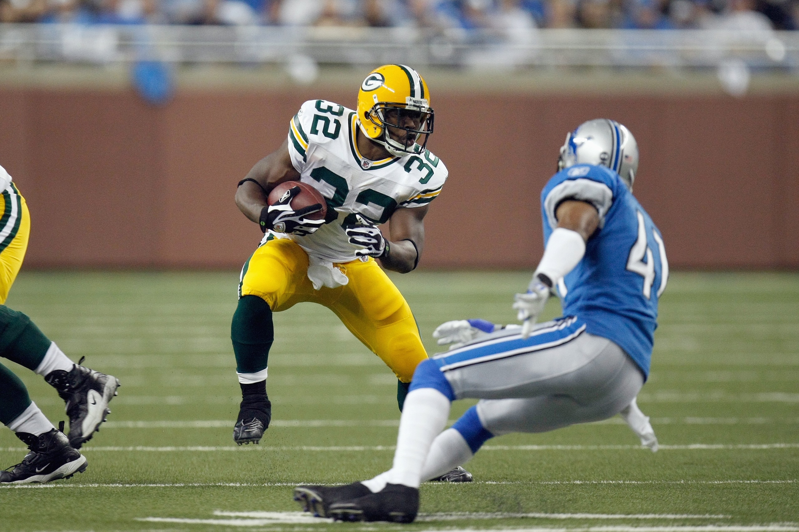 DETROIT , MI - NOVEMBER 26:  Brandon Jackson #32 of the Green Bay Packers carries the ball against the Detroit Lions on November 26, 2009 at Ford Field in Detroit, Michigan. Green Bay won the game 34-12. (Photo by Gregory Shamus/Getty Images)