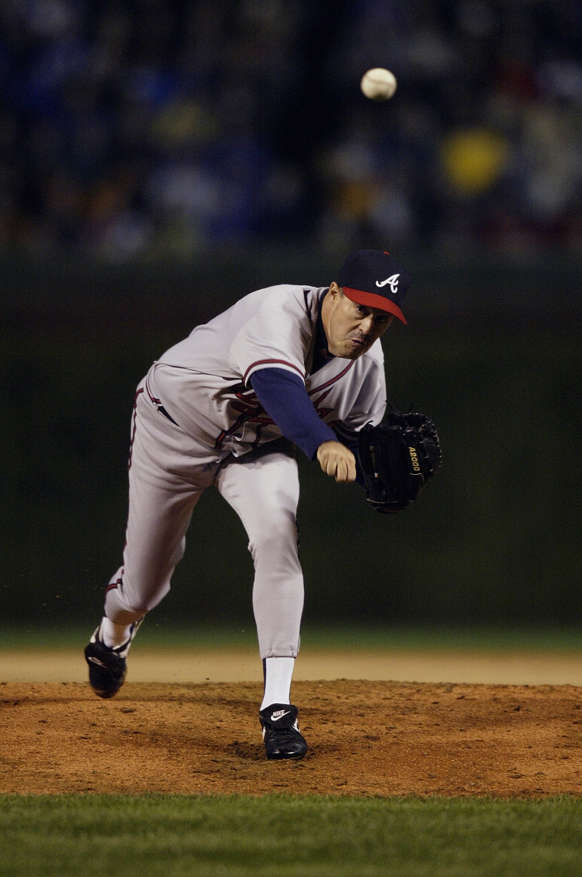 CHICAGO - OCTOBER 3:  Greg Maddux #31 of the Atlanta Braves throws against the Chicago Cubs during game three of the National League Division Series on October 3, 2003 at Wrigley Field in Chicago, Illinois.  The Cubs defeated the Braves 3-1.  (Photo by Ma