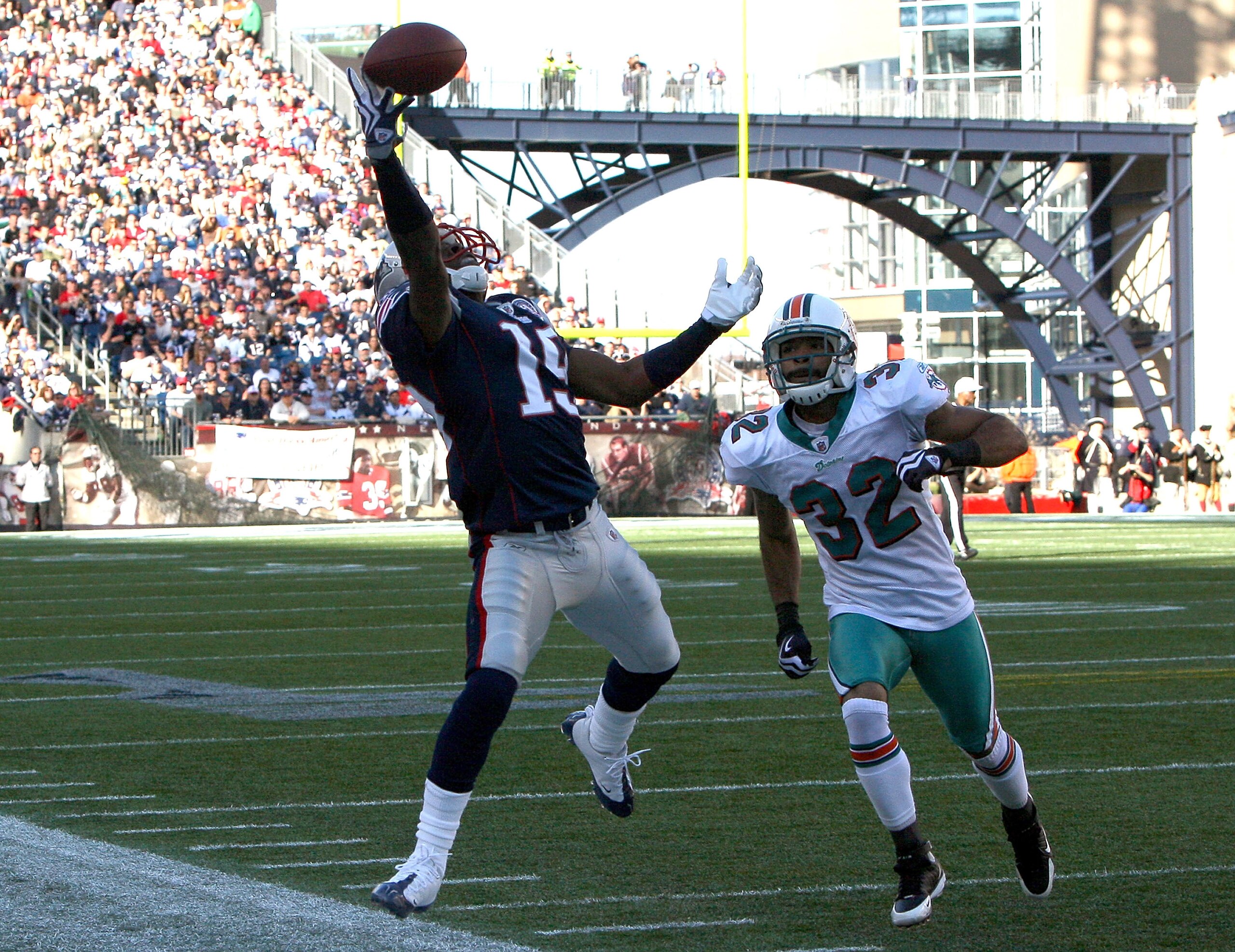 FOXBORO, MA - NOVEMBER 8:  Brandon Tate #19  of the New England Patriots is unable to catch a pass as Jason Allen #32  of the Miami Dolphins defend at Gillette Stadium on November 8, 2009 in Foxboro, Massachusetts. The Patriots won 27-17. (Photo by Jim Ro