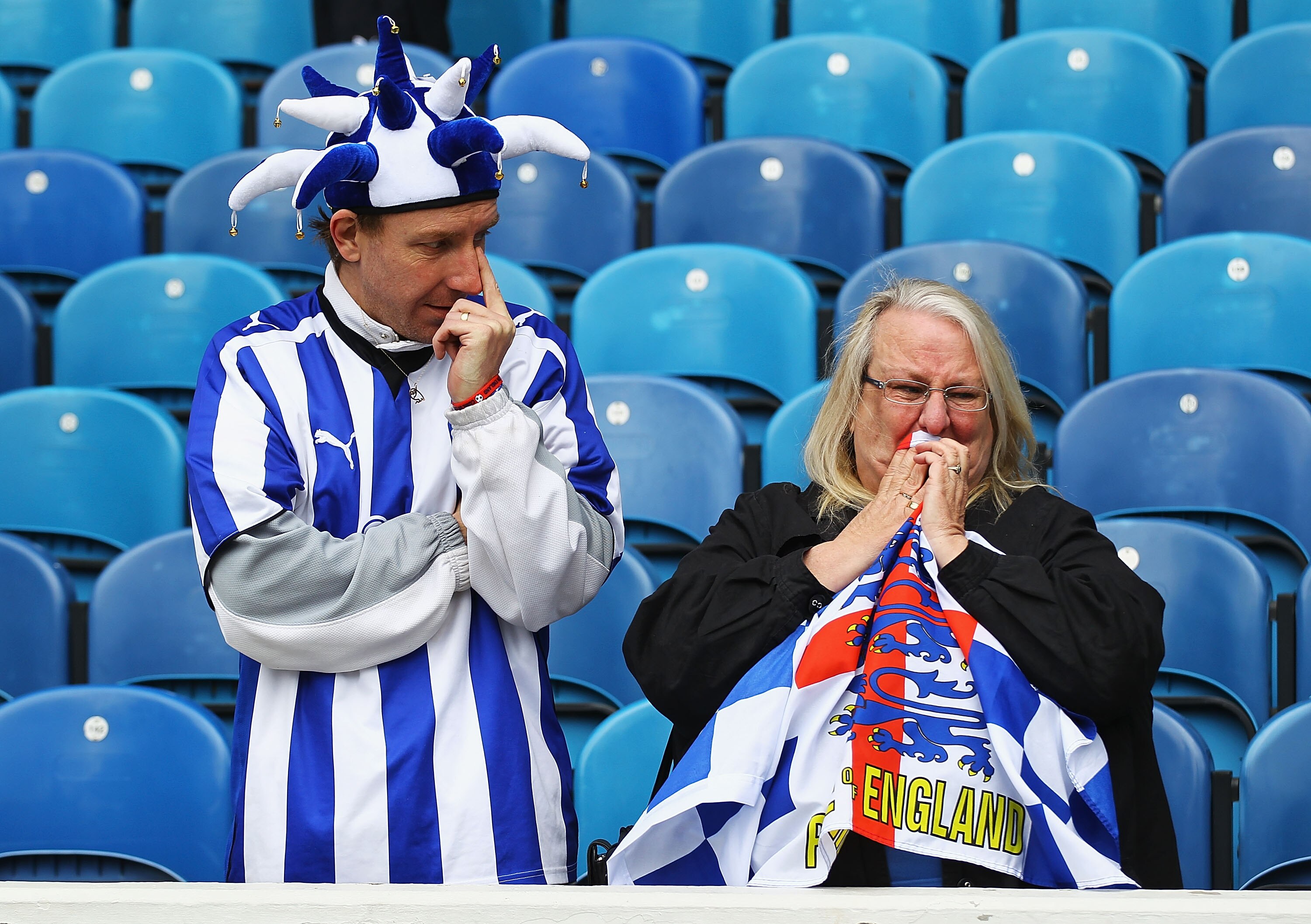 SHEFFIELD, ENGLAND - MAY 02:  Sheffield Wednesday fans look on after their team was relegated to League One following their draw with Crystal Palace in the Coca-Cola Championship match between Sheffield Wednesday and Crystal Palace at Hillsborough on May