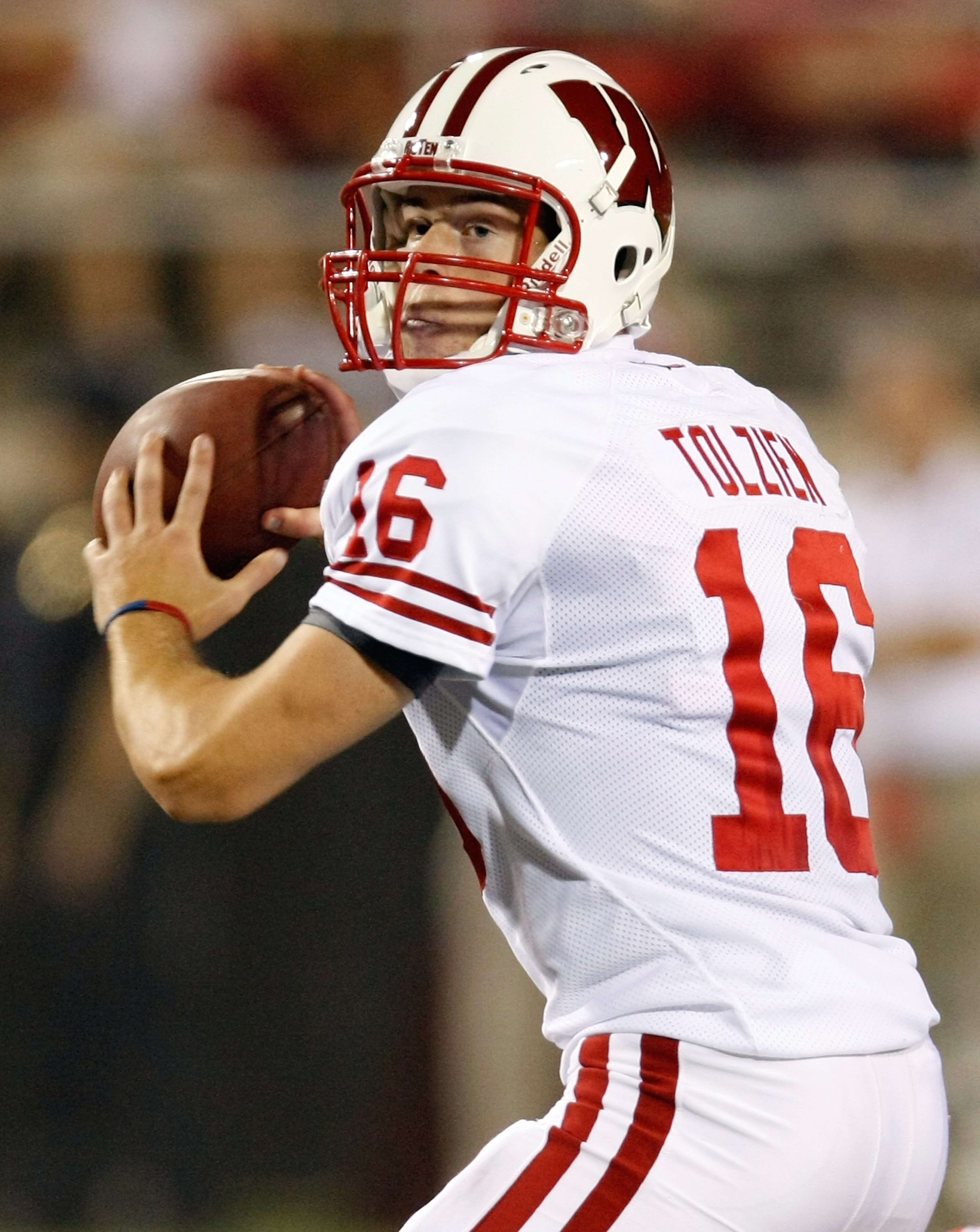 LAS VEGAS - SEPTEMBER 04:  Quarterback Scott Tolzien #16 of the Wisconsin Badgers looks to pass against the UNLV Rebels during their game at Sam Boyd Stadium September 4, 2010 in Las Vegas, Nevada. Wisconsin won 41-21.  (Photo by Ethan Miller/Getty Images