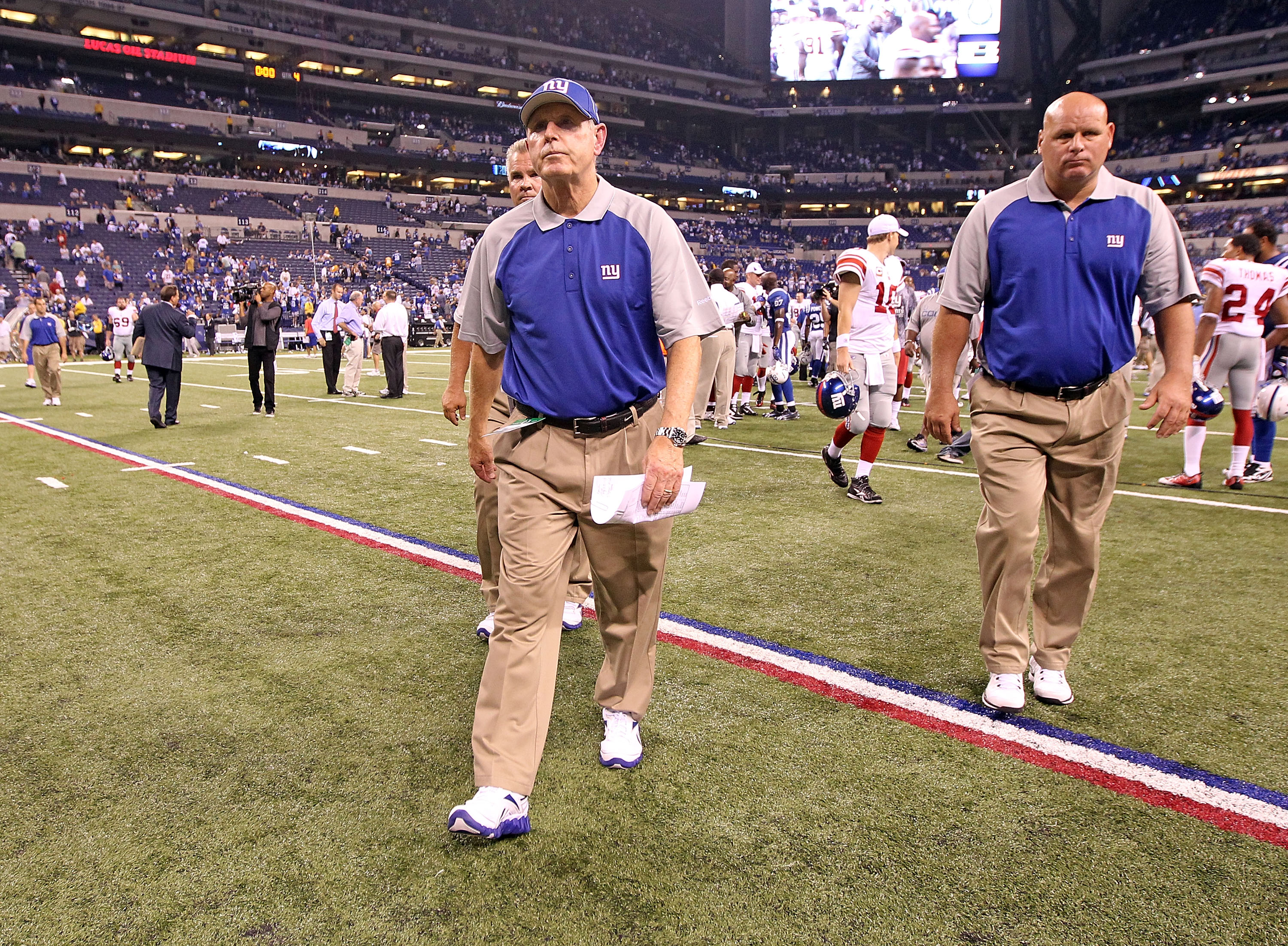 INDIANAPOLIS - SEPTEMBER 19:  Tom Coughlin the Head Coach of the New York Giants walks off of the field following the NFL game against the Indianapolis Colts at Lucas Oil Stadium on September 19, 2010 in Indianapolis, Indiana.  (Photo by Andy Lyons/Getty