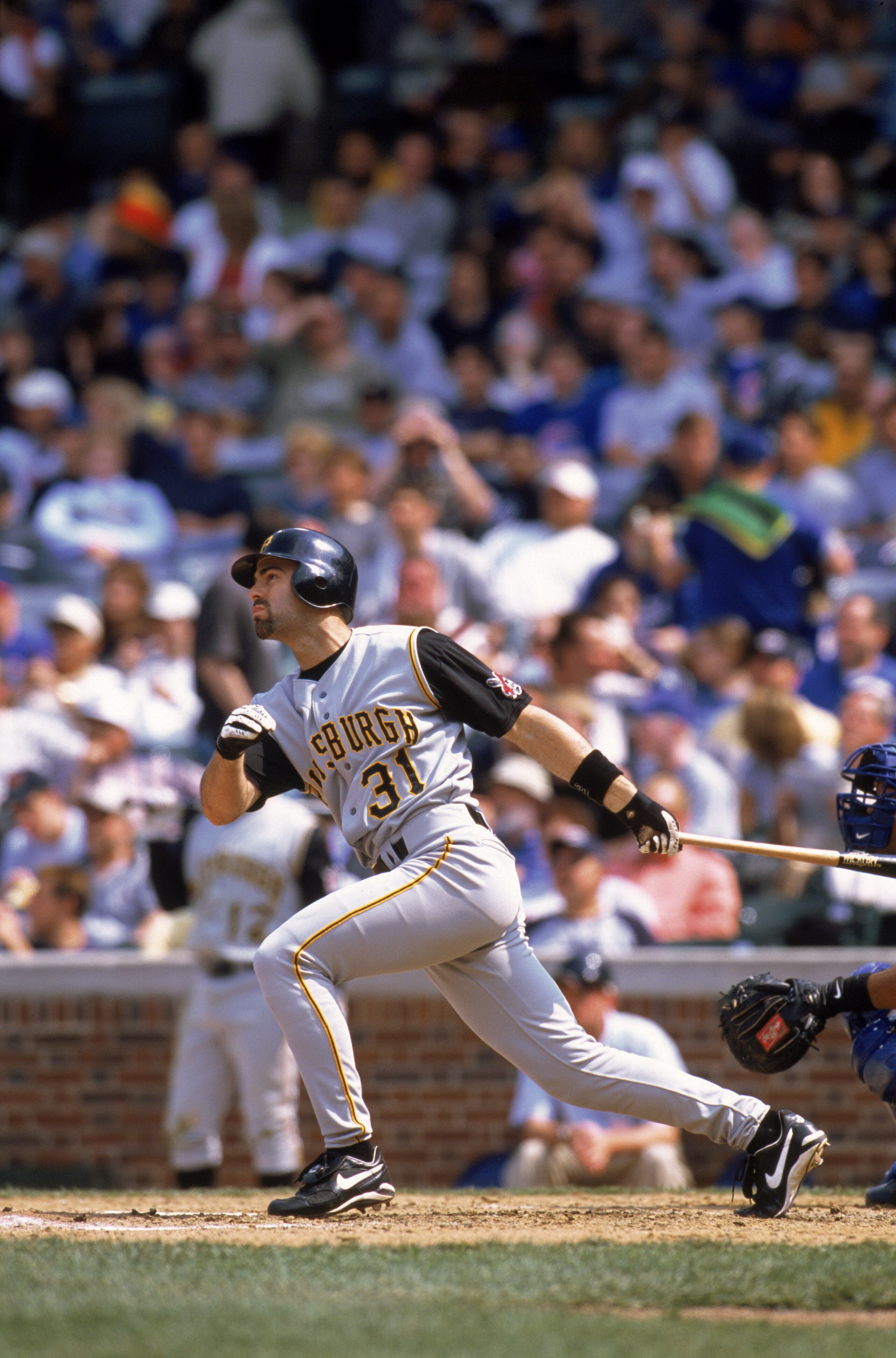 CHICAGO, IL - MAY 23:  Center fielder Chad Hermansen #31 of the Pittsburgh Pirates watches the flight of the ball during the MLB game against the Chicago Cubs at Wrigley Field in Chicago, Illinois on May 23, 2002.  The Cubs defeated the Pirates 11-6.  (Ph