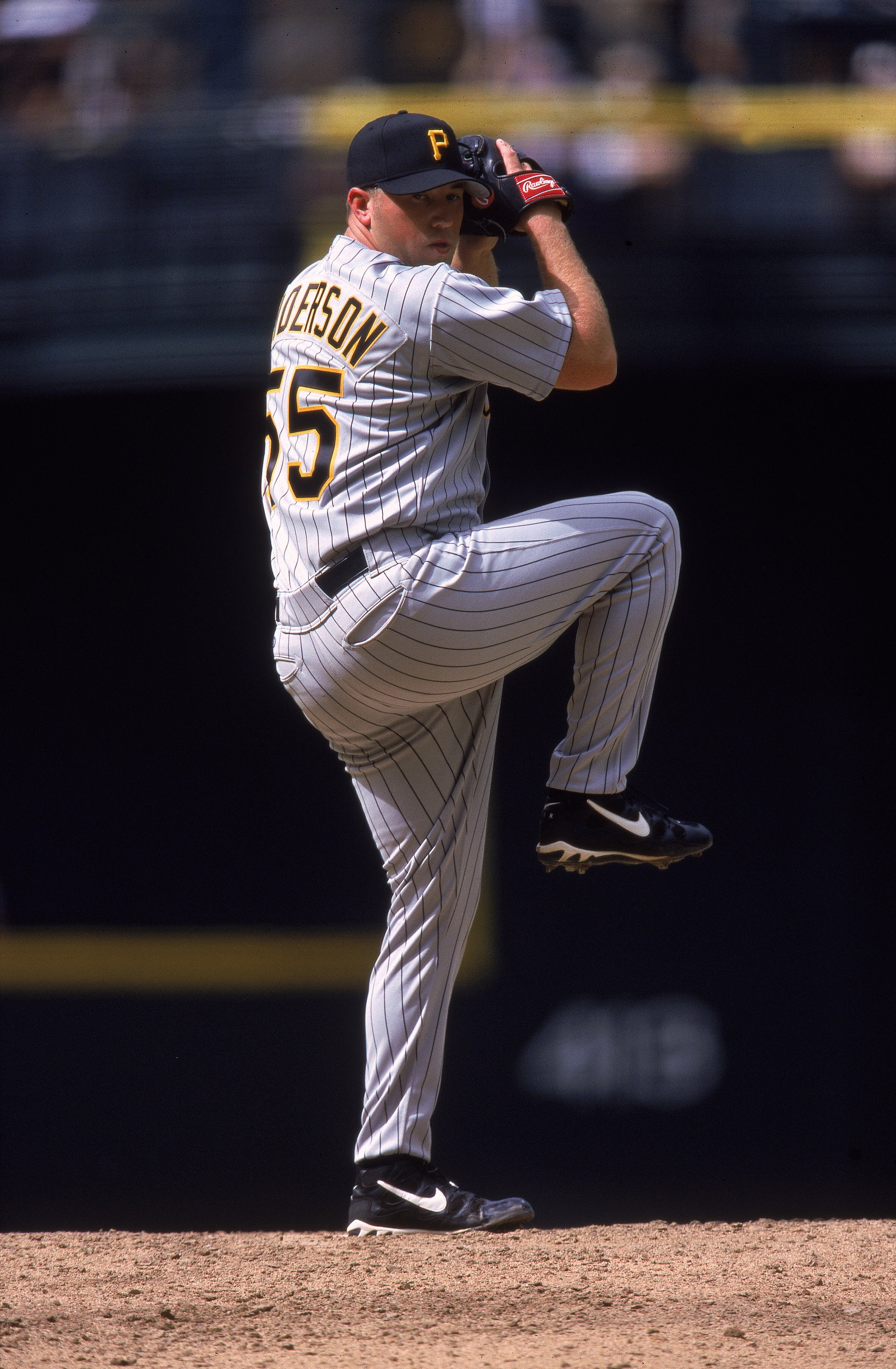9 Apr 2000: Pitcher Jimmy Anderson #55 of the Pittsburgh Pirates winds up for the pitch during the game against the Arizona Diamondbacks at the Bank One Ballpark in Phoenix, Arizona. The Diamondbacks defeated the Pirates 1-0.
