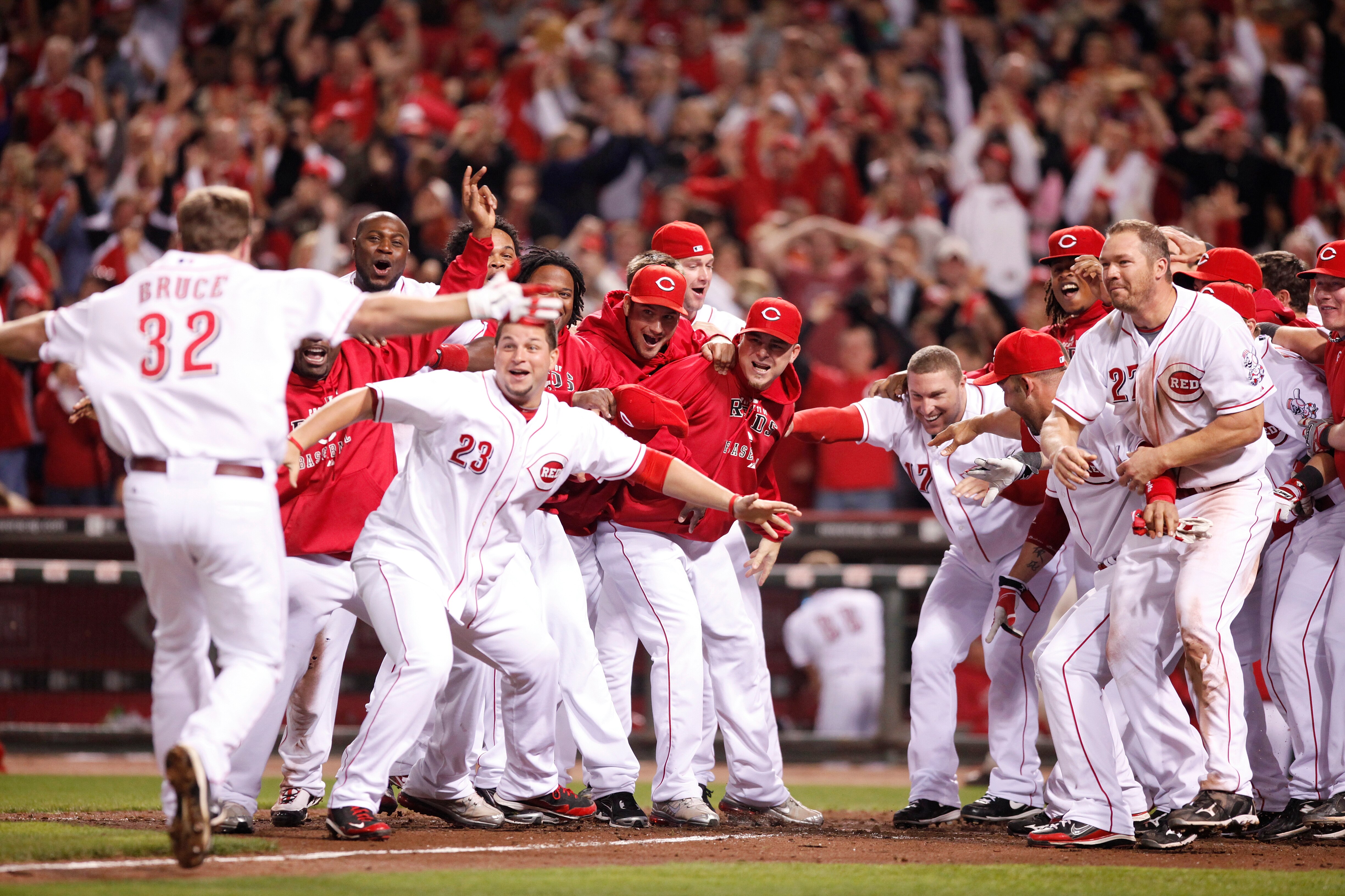 CINCINNATI, OH - SEPTEMBER 28: The Cincinnati Reds celebrate Jay Bruce's walk off home run against the Houston Astros at Great American Ball Park on September 28, 2010 in Cincinnati, Ohio. The Reds won 3-2 to clinch the NL Central Division title. (Photo b