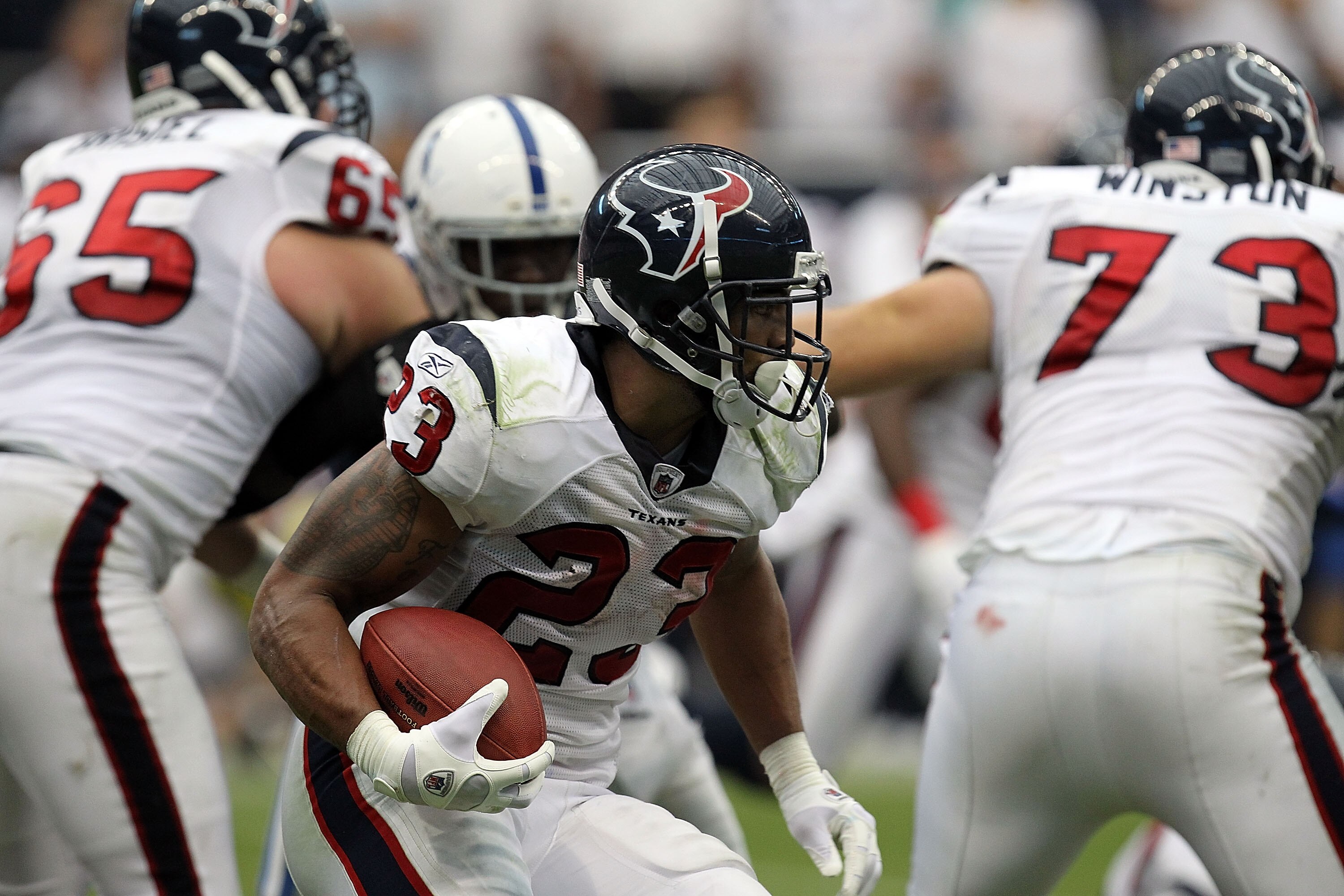 HOUSTON - SEPTEMBER 12:  Running back Arian Foster #23 of the Houston Texans runs in the NFL season opener against the Indianapolis Colts at Reliant Stadium on September 12, 2010 in Houston, Texas.  (Photo by Ronald Martinez/Getty Images)