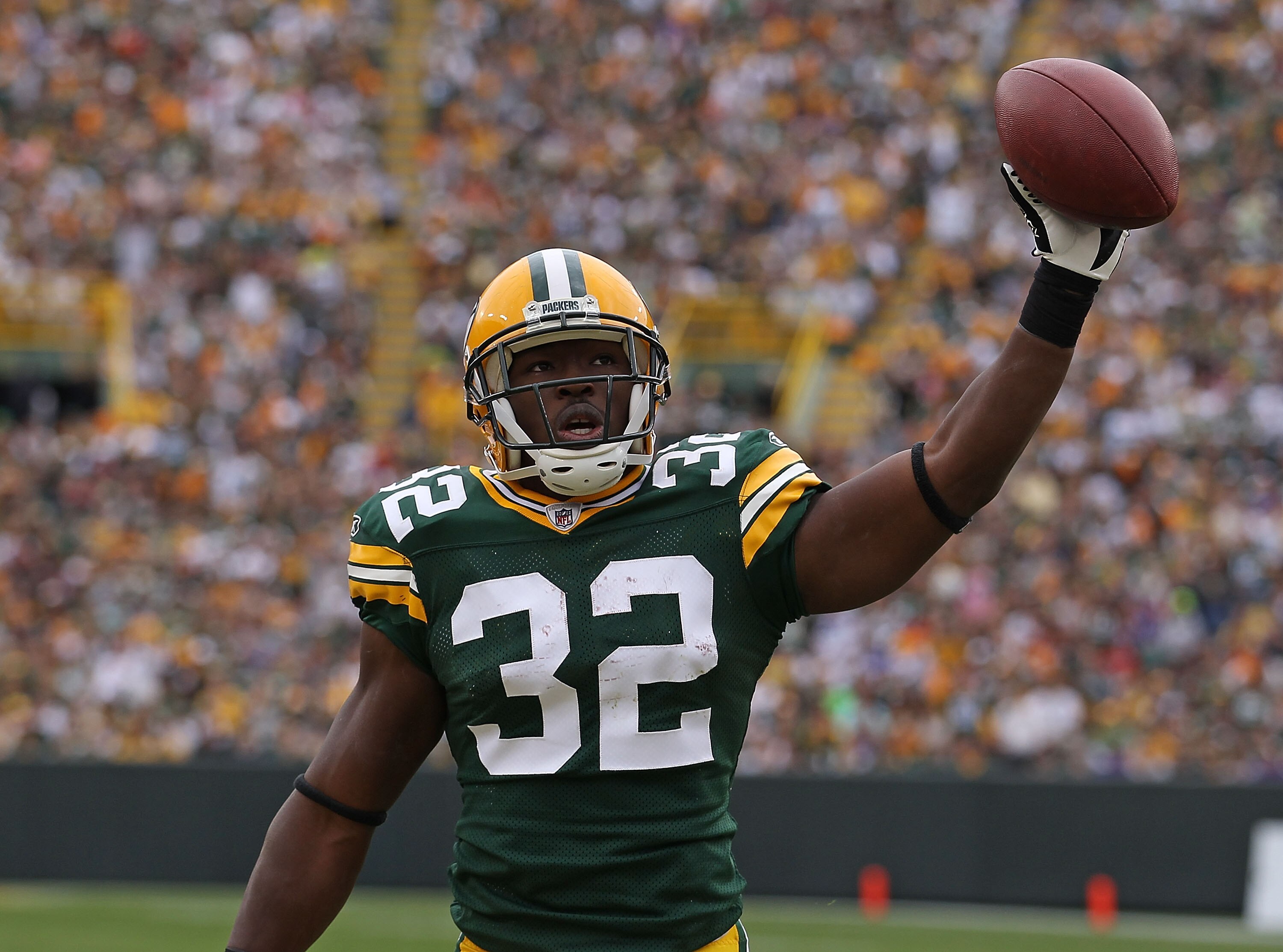 GREEN BAY, WI - SEPTEMBER 19: Brandon Jackson #32 of the Green Bay Packers celebrates a touchdown run against the Buffalo Bills at Lambeau Field on September 19, 2010 in Green Bay, Wisconsin. The Packers defeated the Bills 34-7.  (Photo by Jonathan Daniel