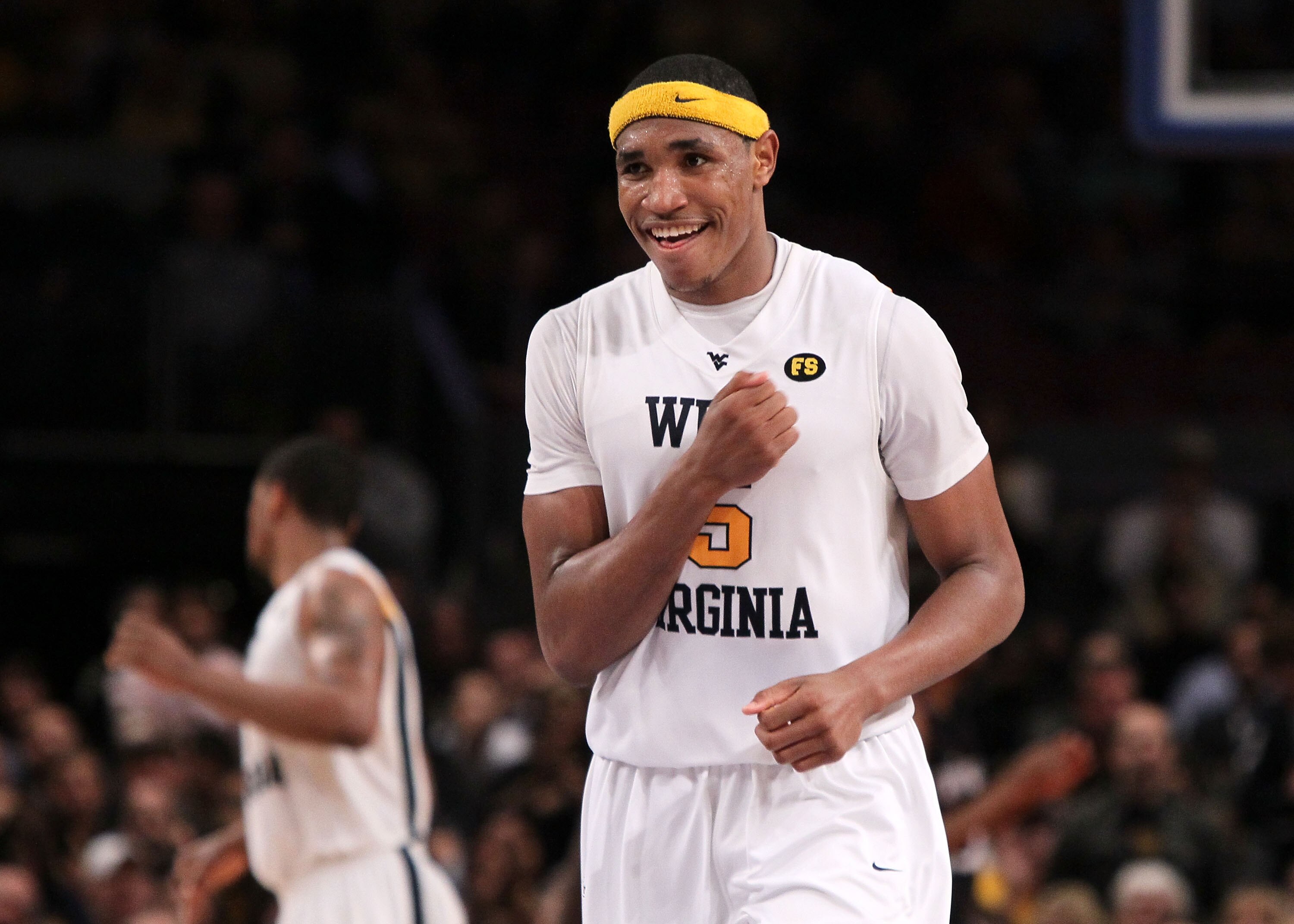 NEW YORK - MARCH 11:  Kevin Jones #5 of the West Virginia Mountaineers reacts after a play against the Cincinnati Bearcats during the quarterfinal of the 2010 NCAA Big East Tournament at Madison Square Garden on March 11, 2010 in New York City.  (Photo by