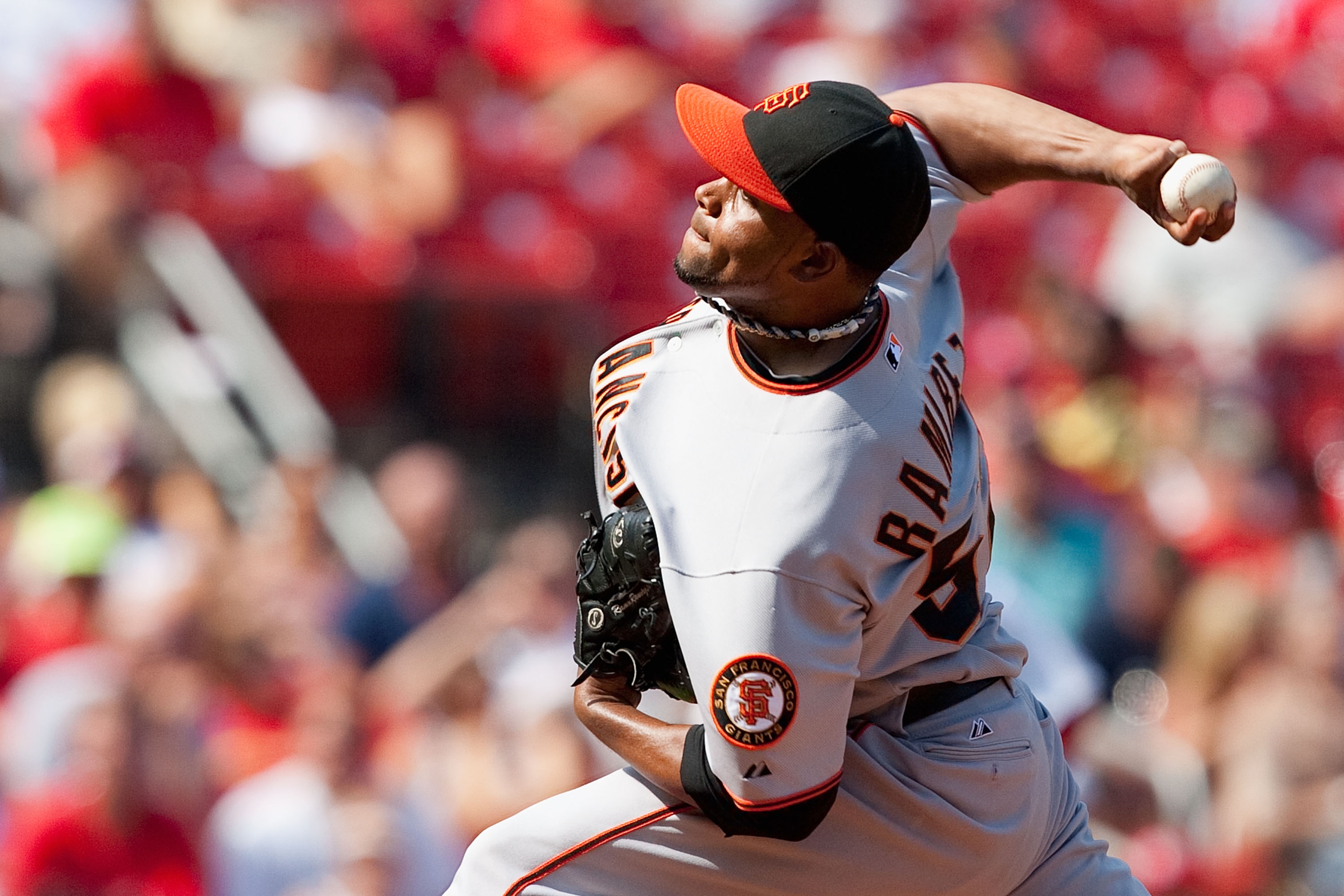 ST. LOUIS - AUGUST 22: Reliever Ramon Ramirez #52 of the San Francisco Giants pitches against the St. Louis Cardinals at Busch Stadium on August 22, 2010 in St. Louis, Missouri.  (Photo by Dilip Vishwanat/Getty Images)
