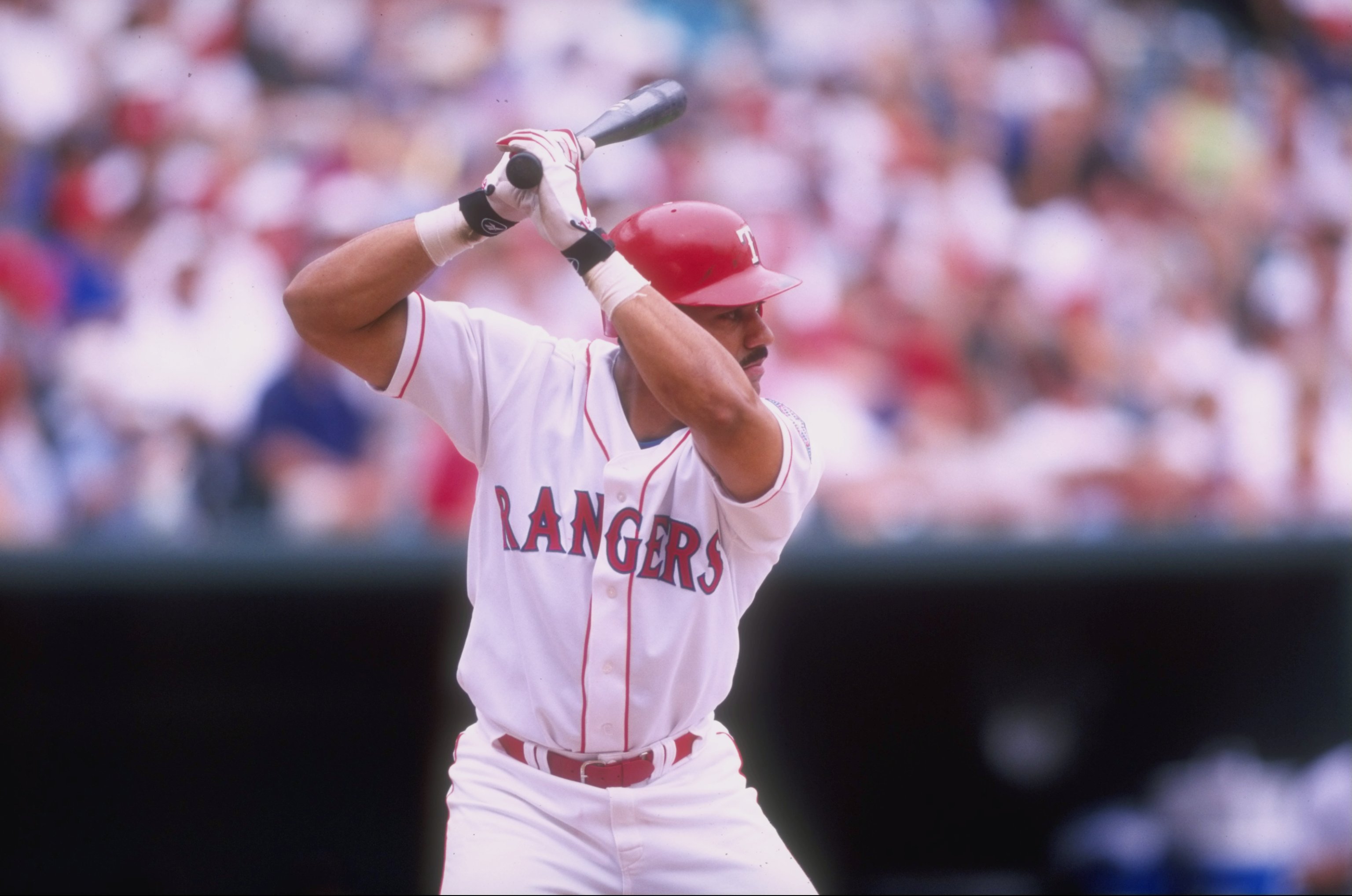 7 Jun 1998: Juan Gonzalez #19 of the Texas Rangers in action during an interleague game against the San Diego Padres at The Ball Park in Arlington, Texas. The Padres defeated the Rangers 17-8.