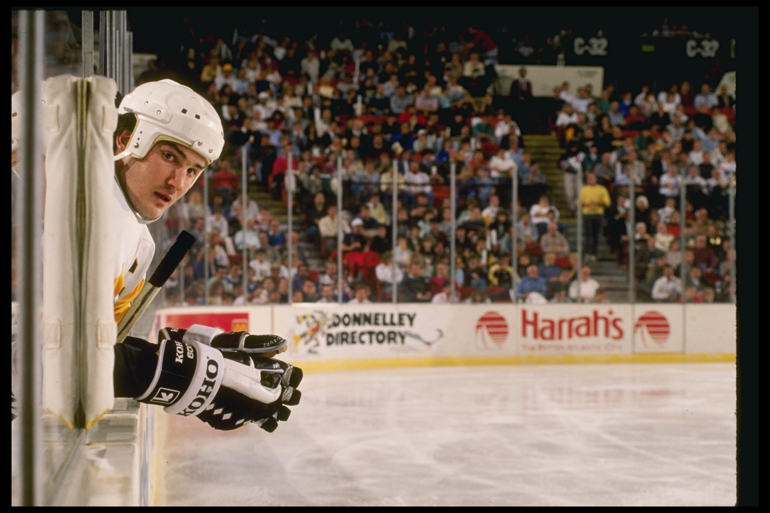 Apr 1985:  Center Mario Lemieux of the Pittsburgh Penguins sits on the bench at the Pittsburgh Civic Arena in Pittsburgh, Pennsylvania.  Mandatory Credit: Allsport  /Allsport