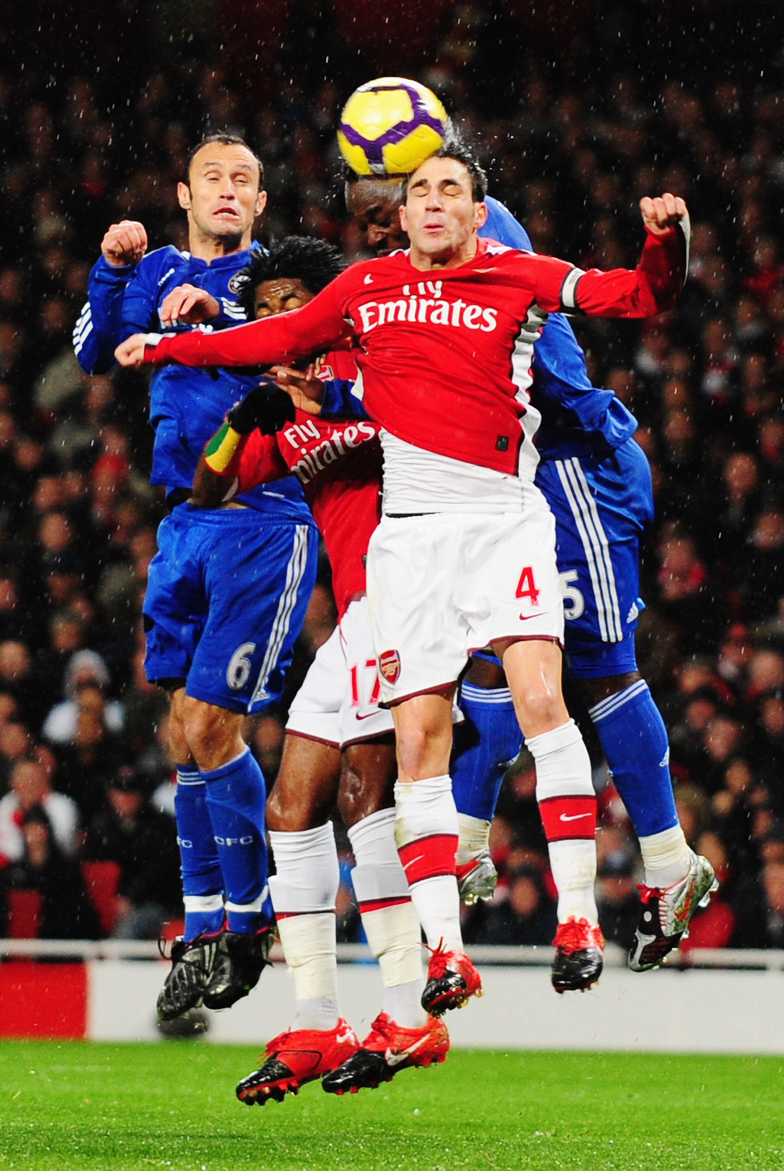 LONDON, ENGLAND - NOVEMBER 29: Cesc Fábregas of Arsenal defends a ball during the Barclays Premier League match between Arsenal and Chelsea at the Emirates Stadium on November 29, 2009 in London, England.  (Photo by Mike Hewitt/Getty Images)