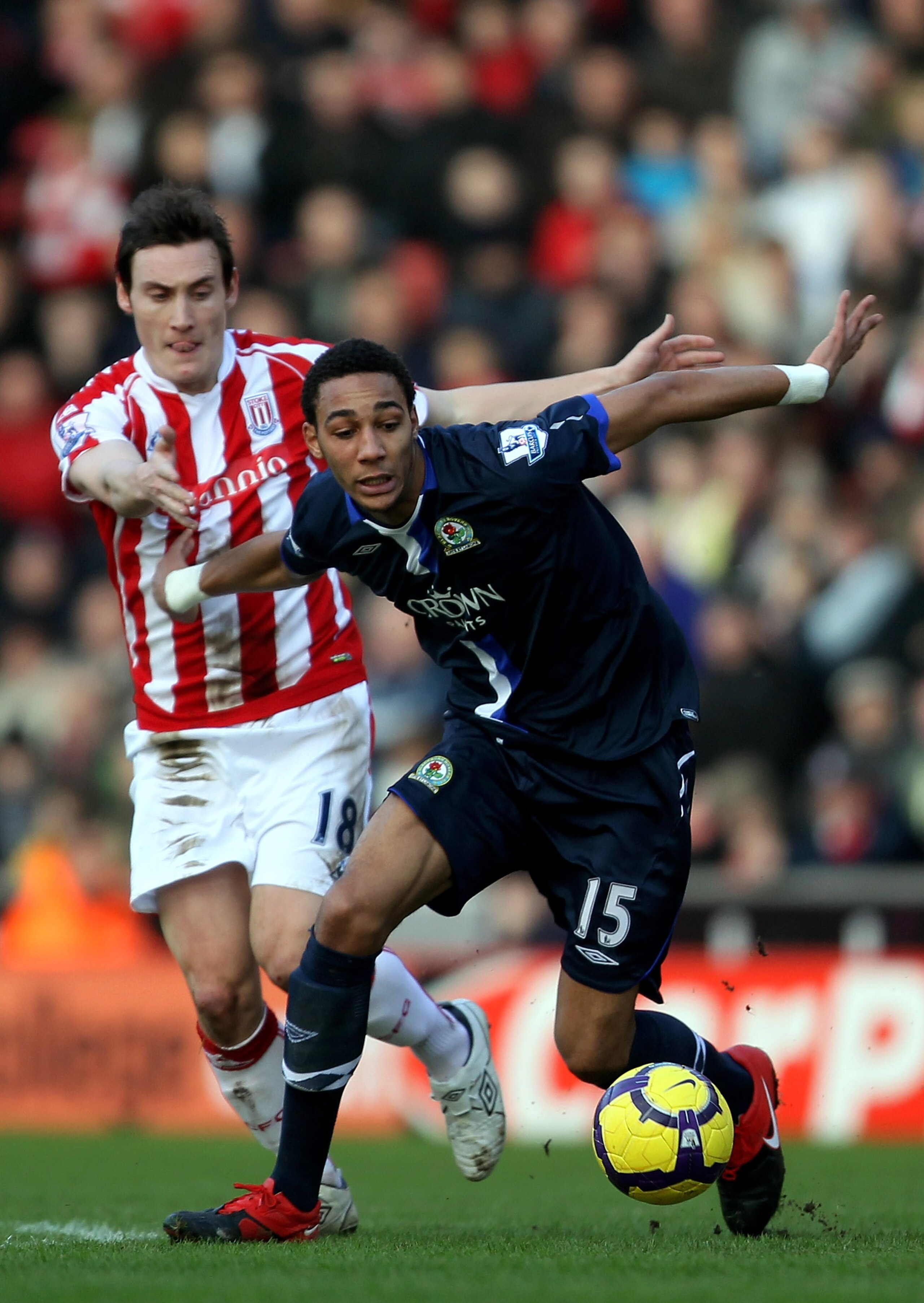 STOKE ON TRENT, ENGLAND - FEBRUARY 06:  Steven N'Zonzi of Blackburn Rovers holds off a challenge from Dean Whitehead of Stoke City during the Barclays Premier League match between Stoke City and Blackburn Rovers at Britannia Stadium on February 6, 2010 in