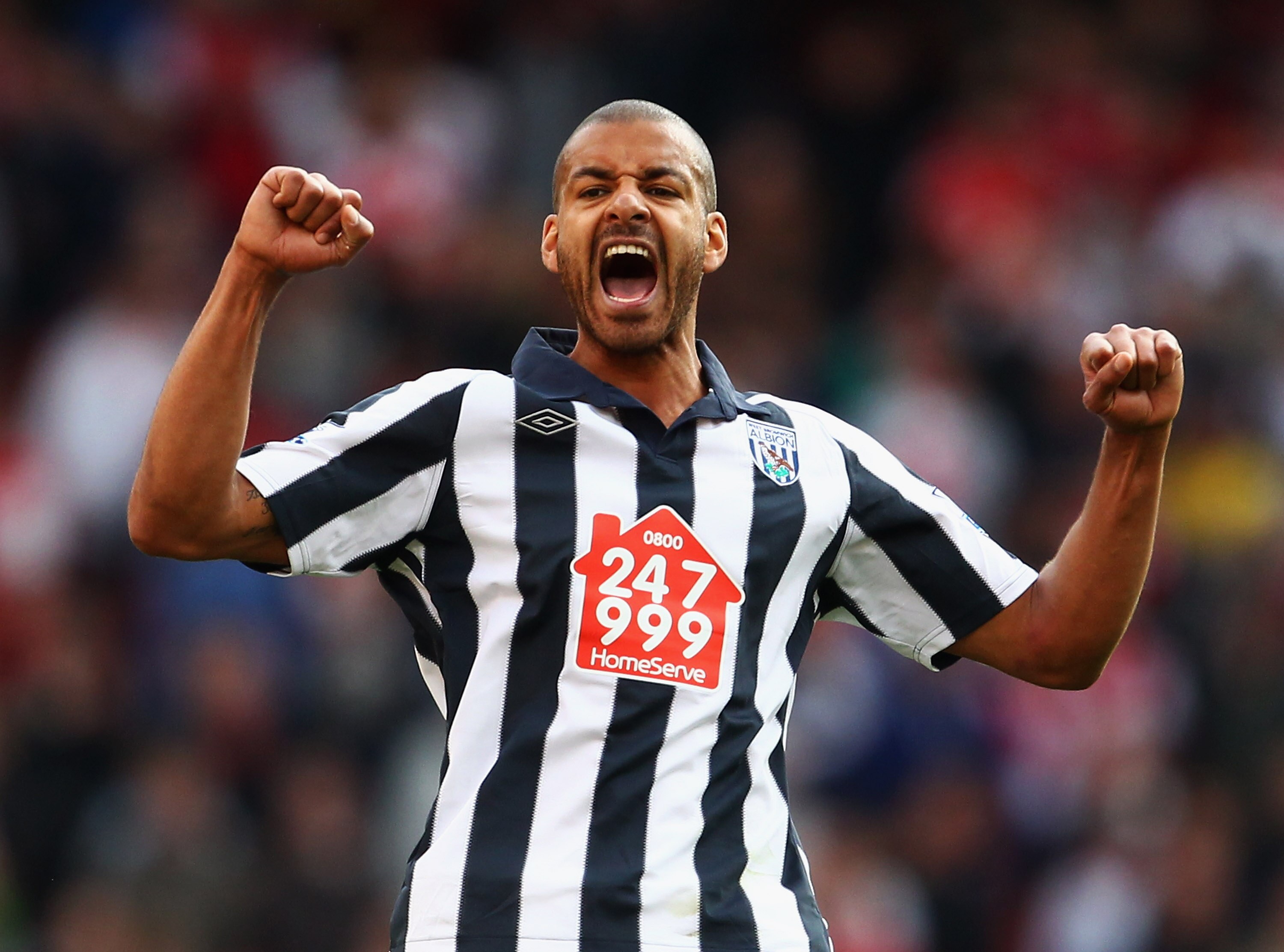LONDON, ENGLAND - SEPTEMBER 25:  Steven Reid of West Bromwich Albion celebrates victory after the Barclays Premier League match between Arsenal and West Bromwich Albion at the Emirates Stadium on September 25, 2010 in London, England.  (Photo by Julian Fi