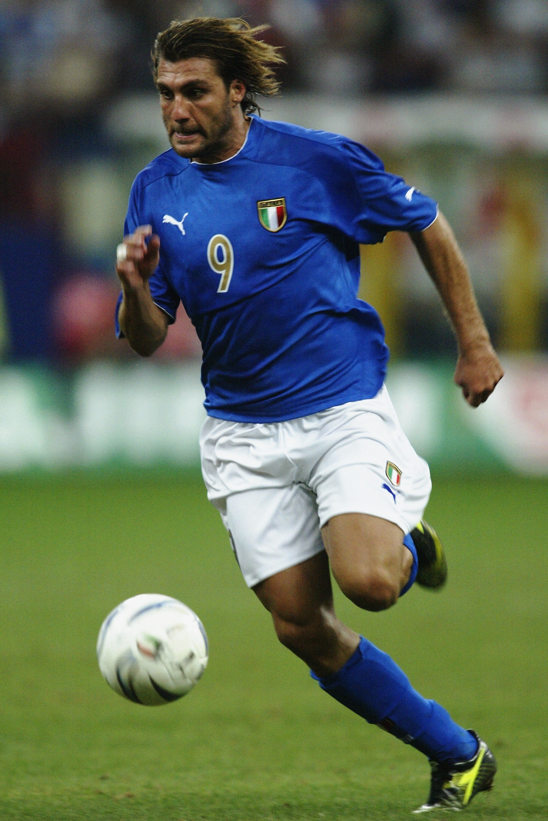 MILAN - SEPTEMBER 6:  Christian Vieri of Italy running with the ball during the Euro 2004 Qualifying Group 9 match between Italy and Wales on September 6, 2003 at the San Siro in Milan, Italy.  Italy won the match 4-0.  (Photo by Mark Thompson/Getty Image