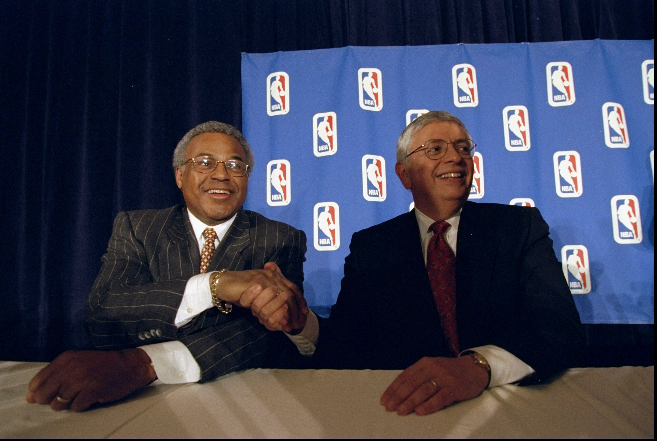 7 Jan 1999:  NBA Union Director Billy Hunter (L) with NBA Commissioner David Stern (R) at the NBA Lockout Ending press conference at the New York Sheraton in New York, New York. Mandatory Credit: Ezra O. Shaw  /Allsport