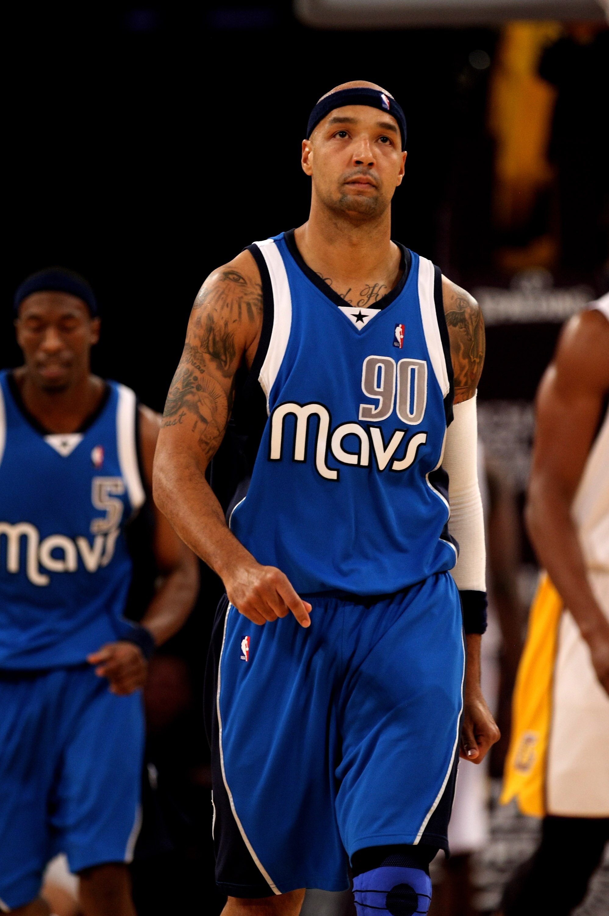 LOS ANGELES - JANUARY 3: Drew Gooden #90 of the Dallas Mavericks walks the other way after shooting an air ball against the Los Angeles Lakers on January 3, 2010 at Staples Center in Los Angeles, California. NOTE TO USER: User expressly acknowledges and a LOS ANGELES - JANUARY 3: Drew Gooden #90 of the Dallas Mavericks walks the other way after shooting an air ball against the Los Angeles Lakers on January 3, 2010 at Staples Center in Los Angeles, California. NOTE TO USER: User expressly acknowledges and a