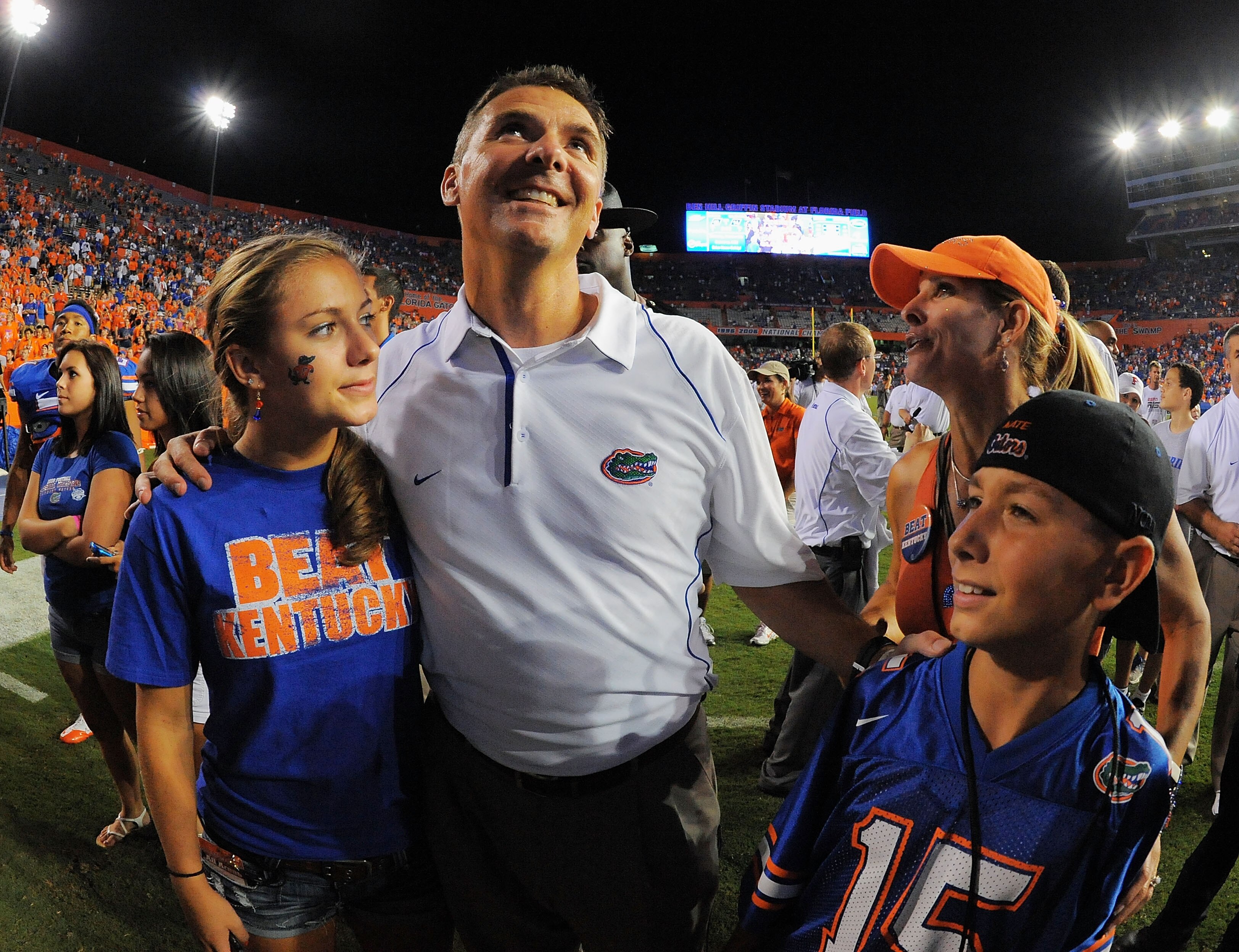 GAINESVILLE, FL - SEPTEMBER 25:  Head coach Urban Meyer of the Florida Gators celebrates with his wife Shelley Meyers and children Gigi Meyers, L, and Nate Meyers, R, after defeating the Kentucky Wildcats at Ben Hill Griffin Stadium on September 25, 2010