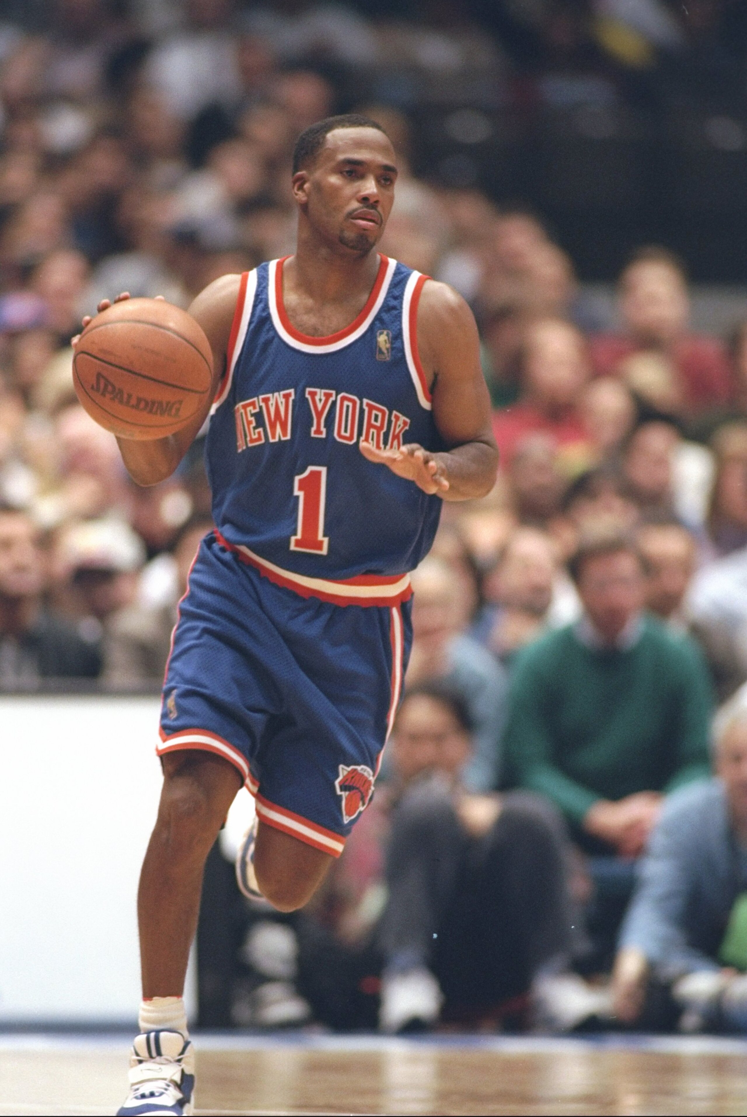 4 Dec 1996: New York Knicks guard Chris Childs dribbles up the court during game against the New Jersey Nets at the Continental Airlines Arena in East Rutherford, New Jersey. The Knicks won the game 103-102. Mandatory Credit: Al Bello /Allsport 4 Dec 1996: New York Knicks guard Chris Childs dribbles up the court during game against the New Jersey Nets at the Continental Airlines Arena in East Rutherford, New Jersey. The Knicks won the game 103-102. Mandatory Credit: Al Bello /Allsport