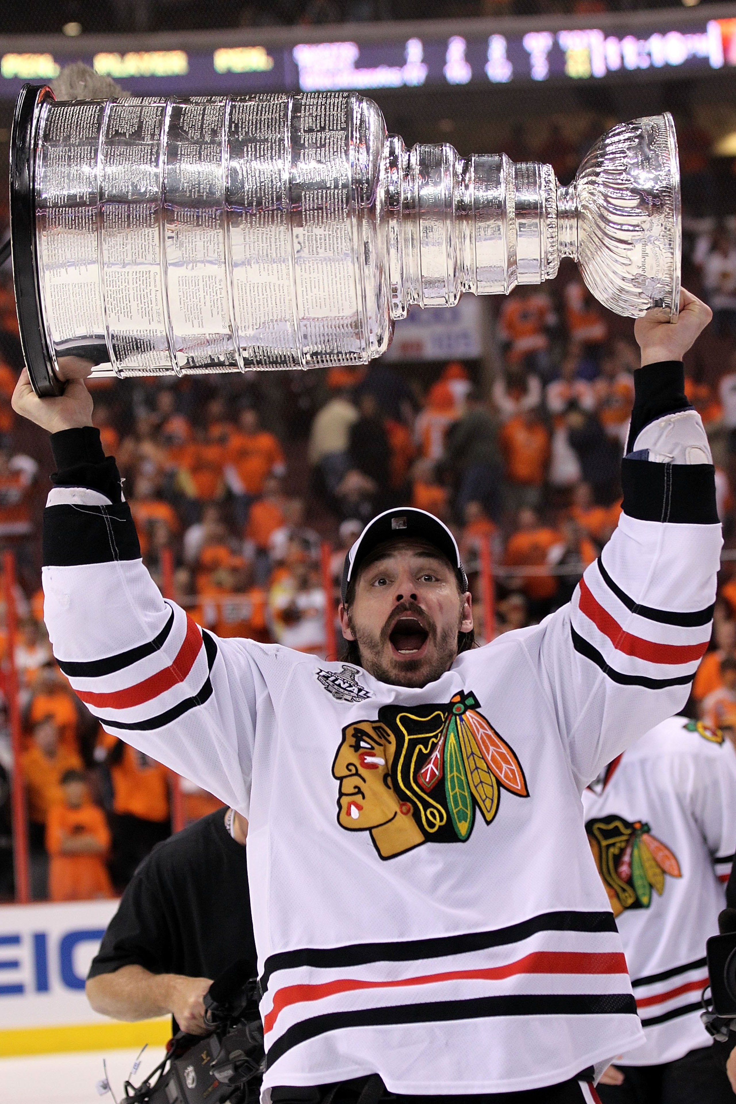 PHILADELPHIA - JUNE 09:  Brent Sopel #5 of the Chicago Blackhawks hoists the Stanley Cup after the Blackhawks defeated the Philadelphia Flyers 4-3 in overtime to win the Stanley Cup in Game Six of the 2010 NHL Stanley Cup Final at the Wachovia Center on J