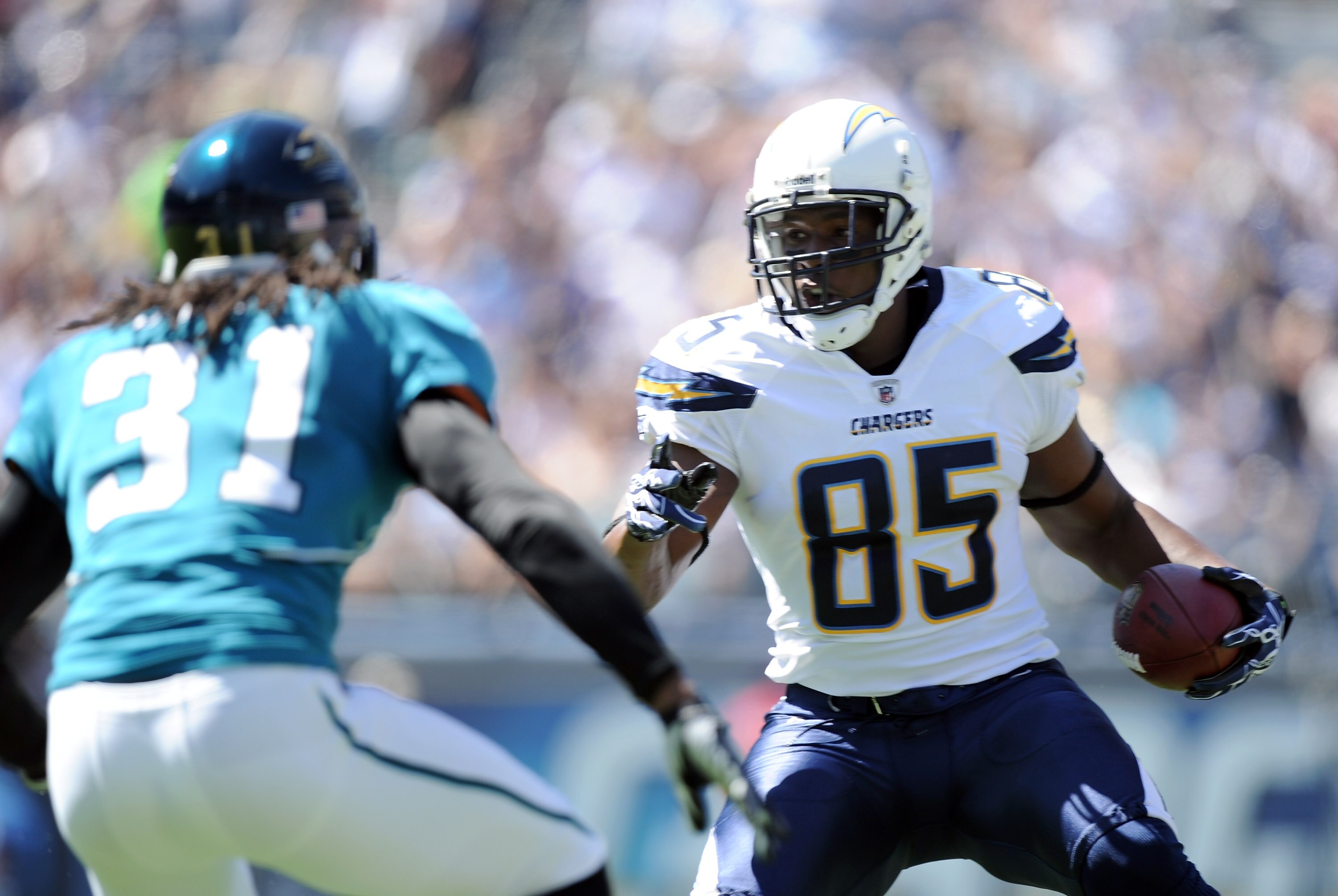 SAN DIEGO - SEPTEMBER 19:  Antonio Gates #85 of the San Diego Chargers attempts to get around David Jones #31 of the Jacksonville Jaguars during the first quarter at Qualcomm Stadium on September 19, 2010 in San Diego, California.  (Photo by Harry How/Get
