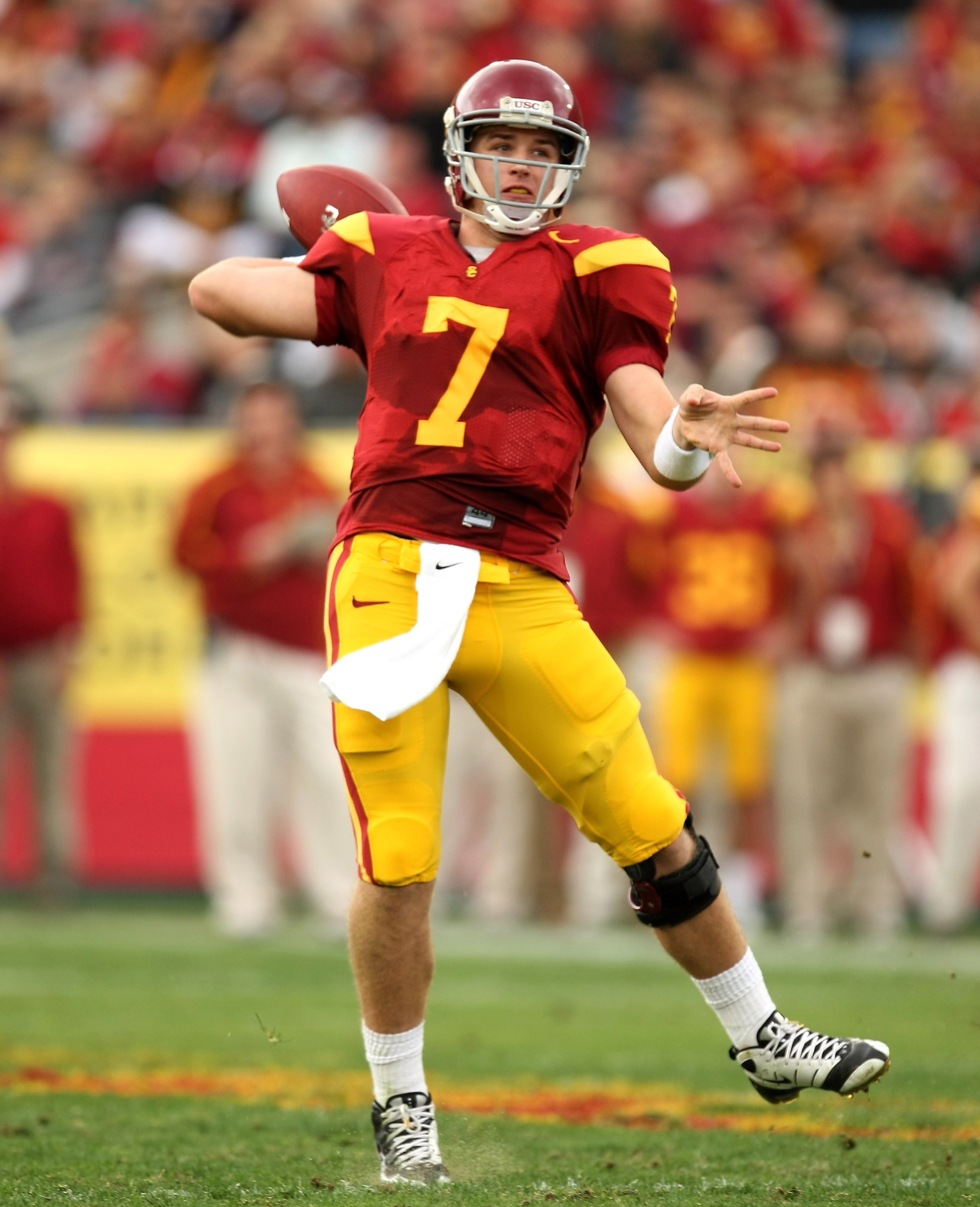 LOS ANGELES - DECEMBER 5:  Quarterback Matt Barkely #7 of the USC Trojans throw a pass against the Arizona Wildcats on December 5, 2009 at the Los Angeles Coliseum in Los Angeles, California.   (Photo by Stephen Dunn/Getty Images)