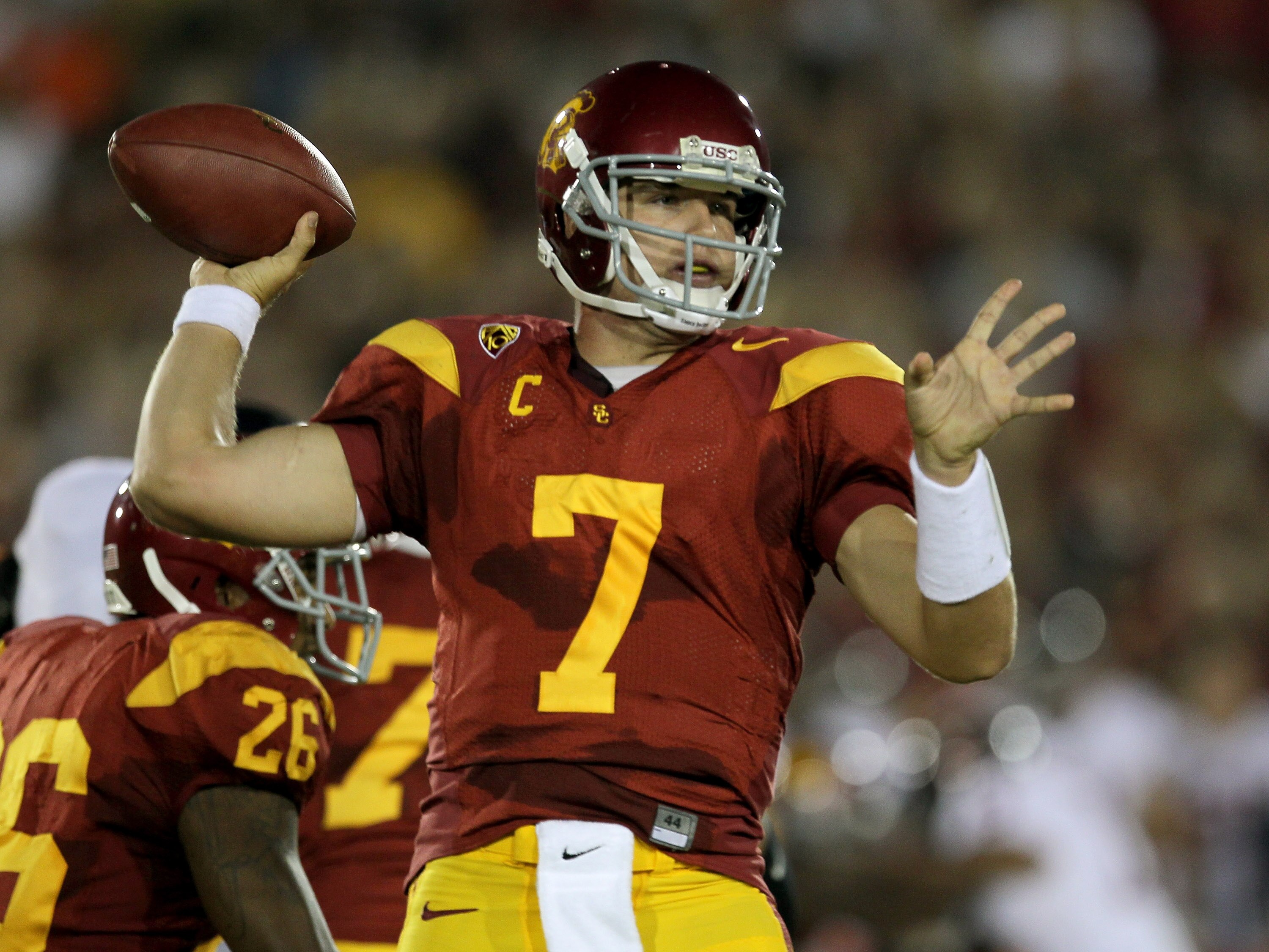 LOS ANGELES - SEPTEMBER 11:  Quarterback Matt Barkley #7 of the USC Trojans throws a pass against the Virginia Cavaliers at Los Angeles Memorial Coliseum on September 11, 2010 in Los Angeles, California. (Photo by Stephen Dunn/Getty Images)