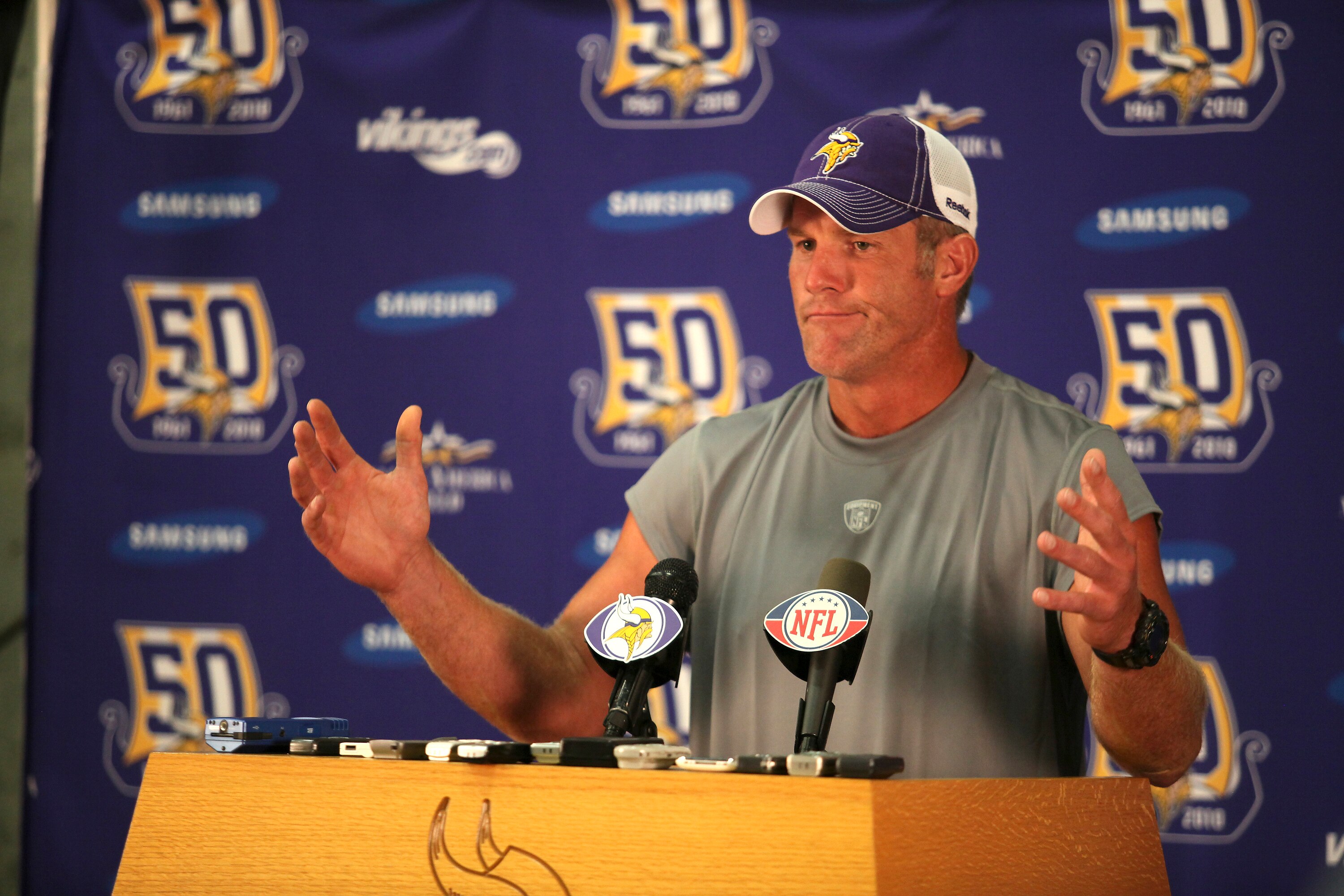 EDEN PRAIRIE, MN - AUGUST 18: Minnesota Vikings quarterback Brett Favre addresses the media at a press conference after the first morning practice since returning to Vikings Winter Park on August 18, 2010 in Eden Prairie, Minnesota. Favre injured his ankl