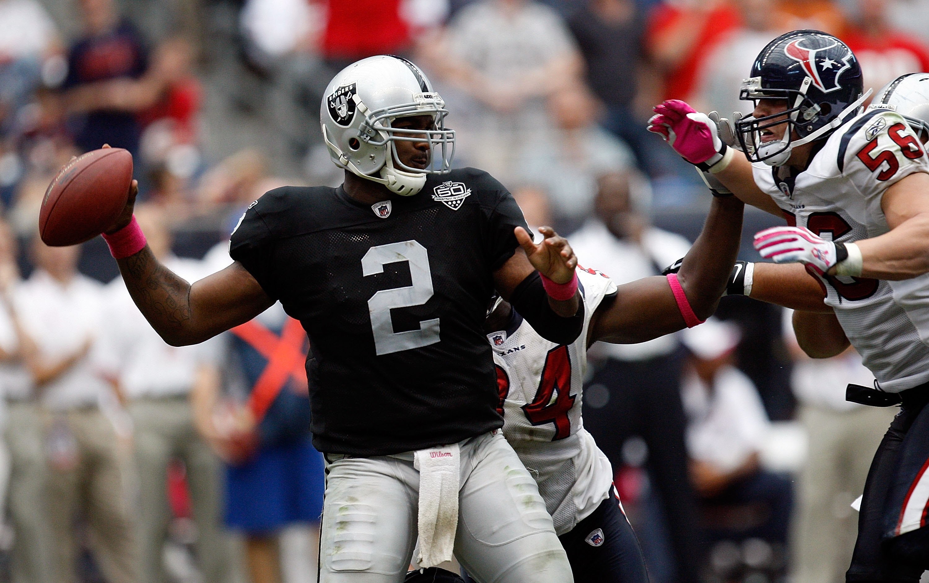 HOUSTON - OCTOBER 04: Quarterback JaMarcus Russell #2 of the Oakland Raiders at Reliant Stadium on October 4, 2009 in Houston, Texas. (Photo by Ronald Martinez/Getty Images) HOUSTON - OCTOBER 04: Quarterback JaMarcus Russell #2 of the Oakland Raiders at Reliant Stadium on October 4, 2009 in Houston, Texas. (Photo by Ronald Martinez/Getty Images)