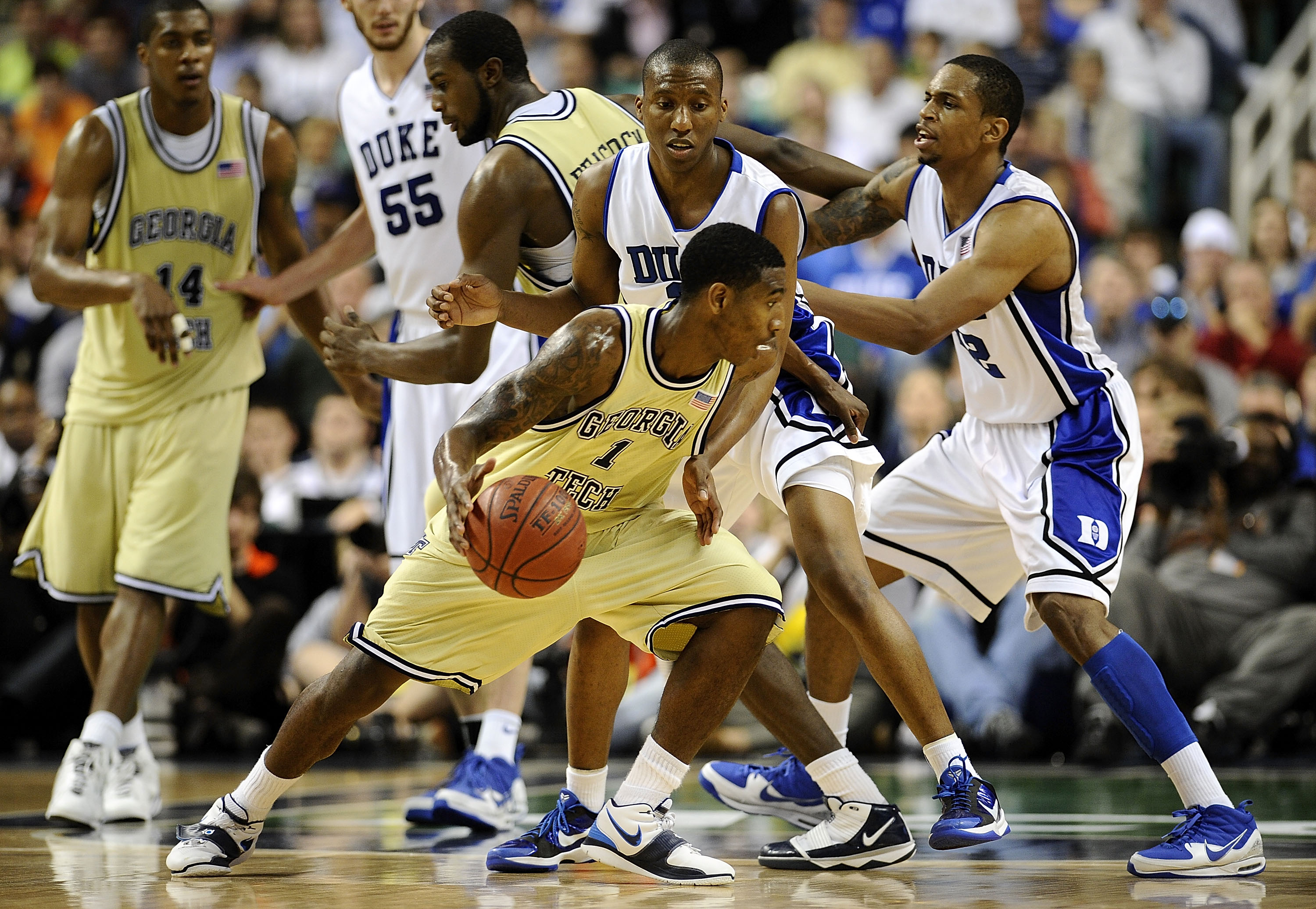 GREENSBORO, NC - MARCH 14:  Nolan Smith #2 of the Duke Blue Devils guards Iman Shumpert #1 of the Georgia Tech Yellow Jackets in the championship game of the 2010 ACC Men's Basketball Tournament at the Greensboro Coliseum on March 14, 2010 in Greensboro,