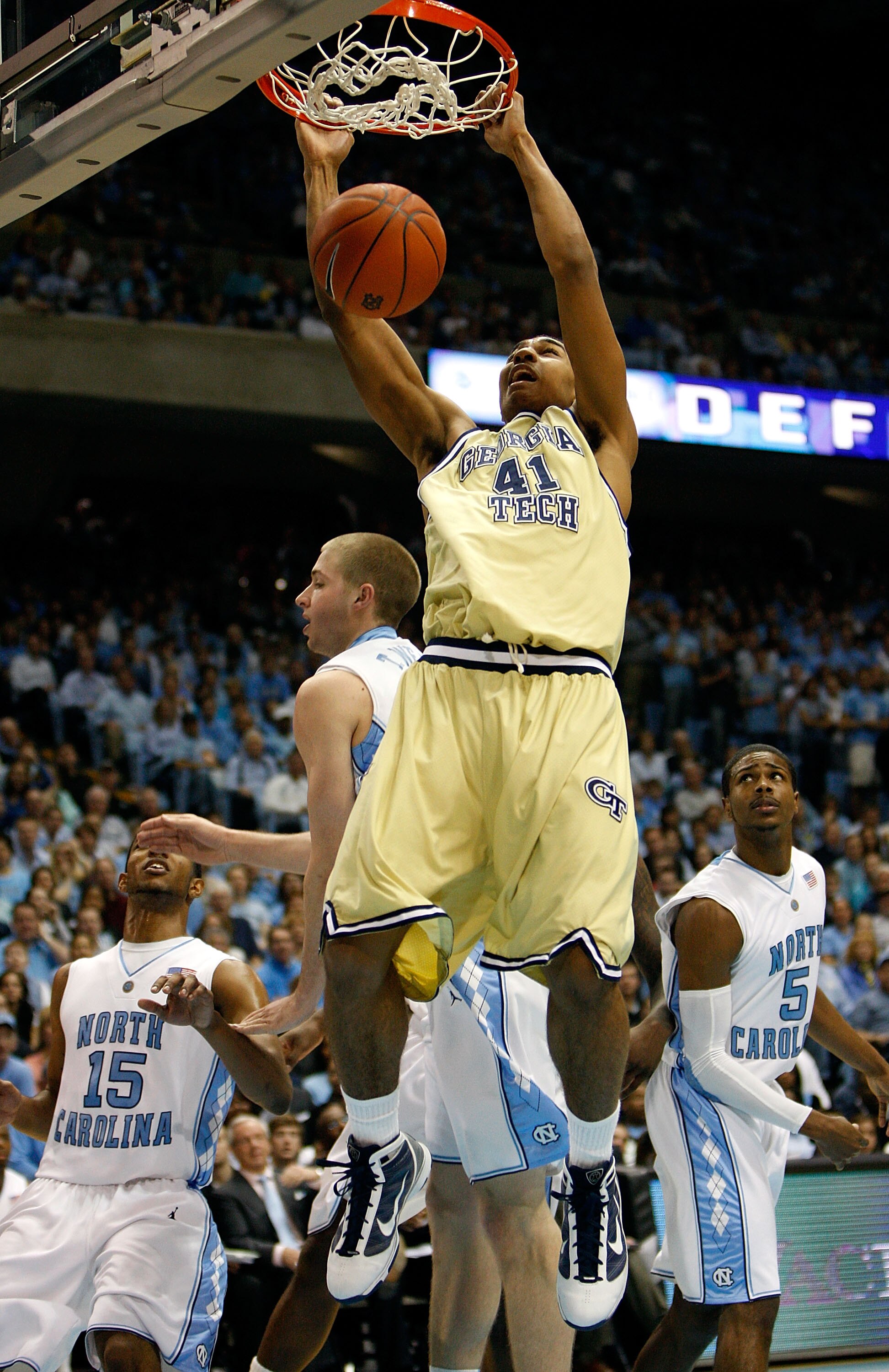 CHAPEL HILL, NC - JANUARY 16:  Glen Rice Jr. #41 of the Georgia Tech Yellow Jackets celebrates as he dunks the ball against the North Carolina Tar Heels during their game at the Dean Smith Center on January 16, 2010 in Chapel Hill, North Carolina.  (Photo