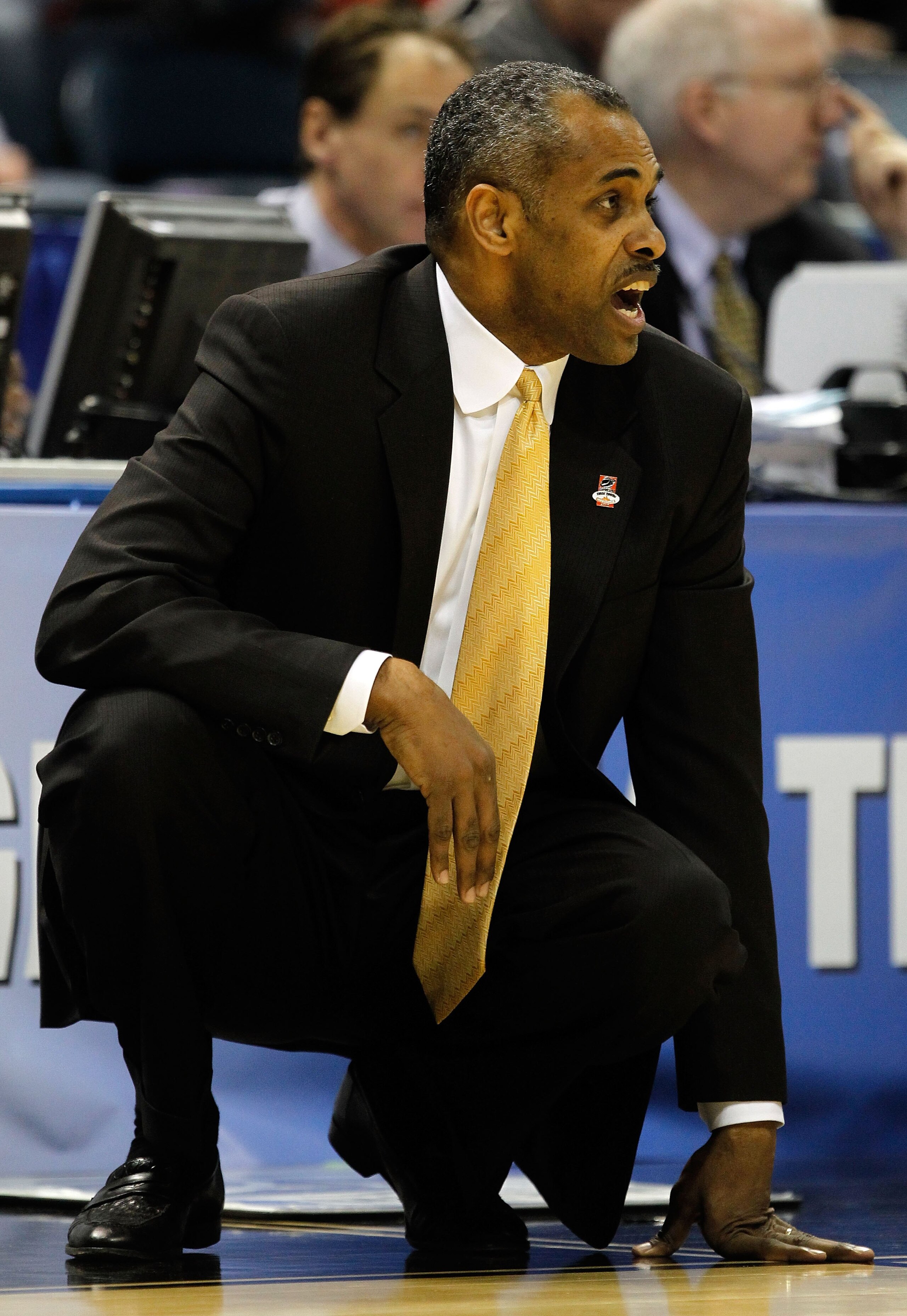 MILWAUKEE - MARCH 19: Head coach Paul Hewitt of the Georgia Tech Yellow Jackets looks on in the first half against the Oklahoma State Cowboys during the first round of the 2010 NCAA men's basketball tournament at the Bradley Center on March 19, 2010 in M MILWAUKEE - MARCH 19: Head coach Paul Hewitt of the Georgia Tech Yellow Jackets looks on in the first half against the Oklahoma State Cowboys during the first round of the 2010 NCAA men's basketball tournament at the Bradley Center on March 19, 2010 in M