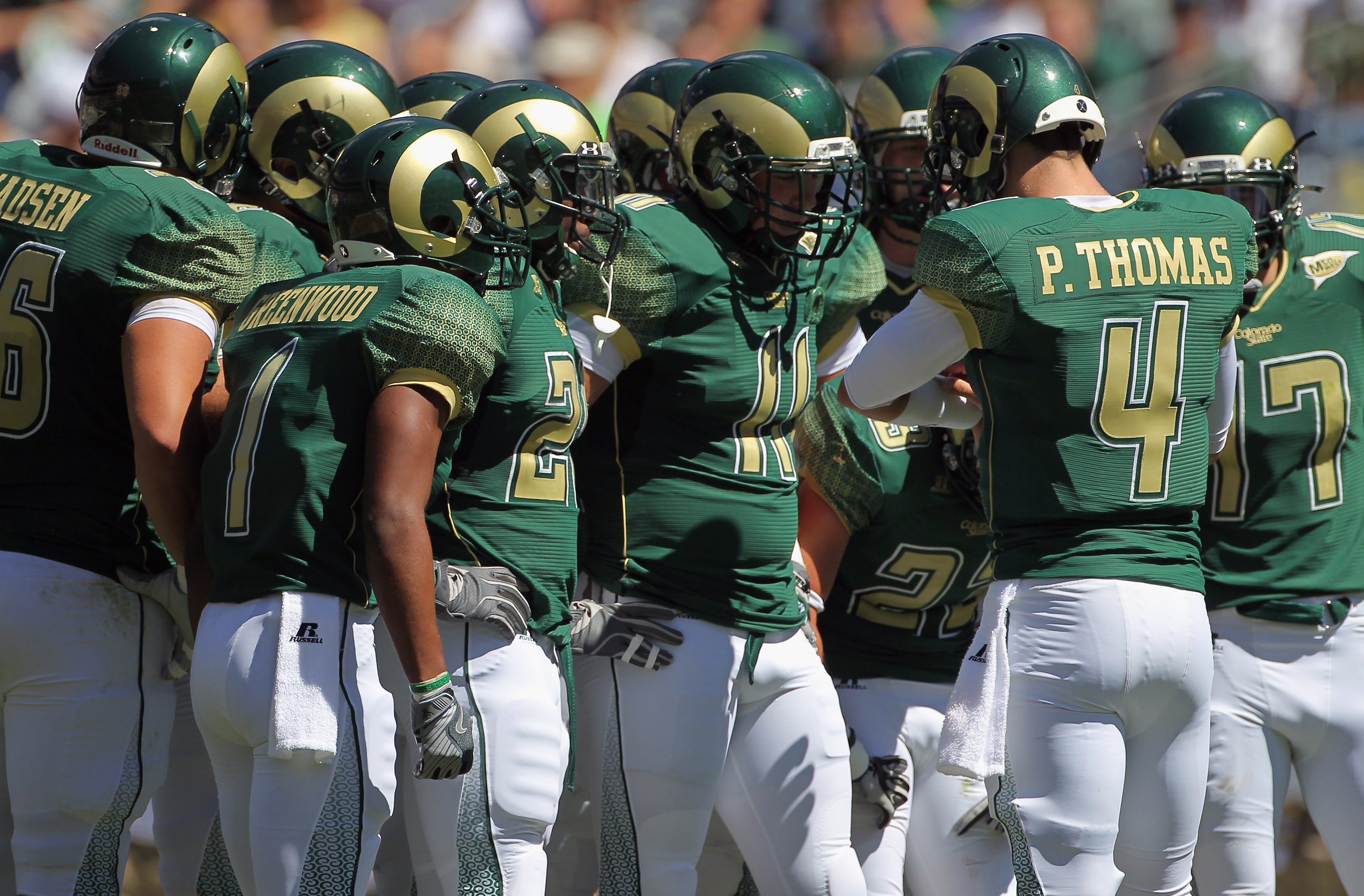 DENVER - SEPTEMBER 04:  Quarterback Pete Thomas #4 of the Colorado State Rams runs the huddle against the Colorado Buffaloes during the Rocky Mountain Showdown at INVESCO Field at Mile High on September 4, 2010 in Denver, Colorado. Colorado was awarded th