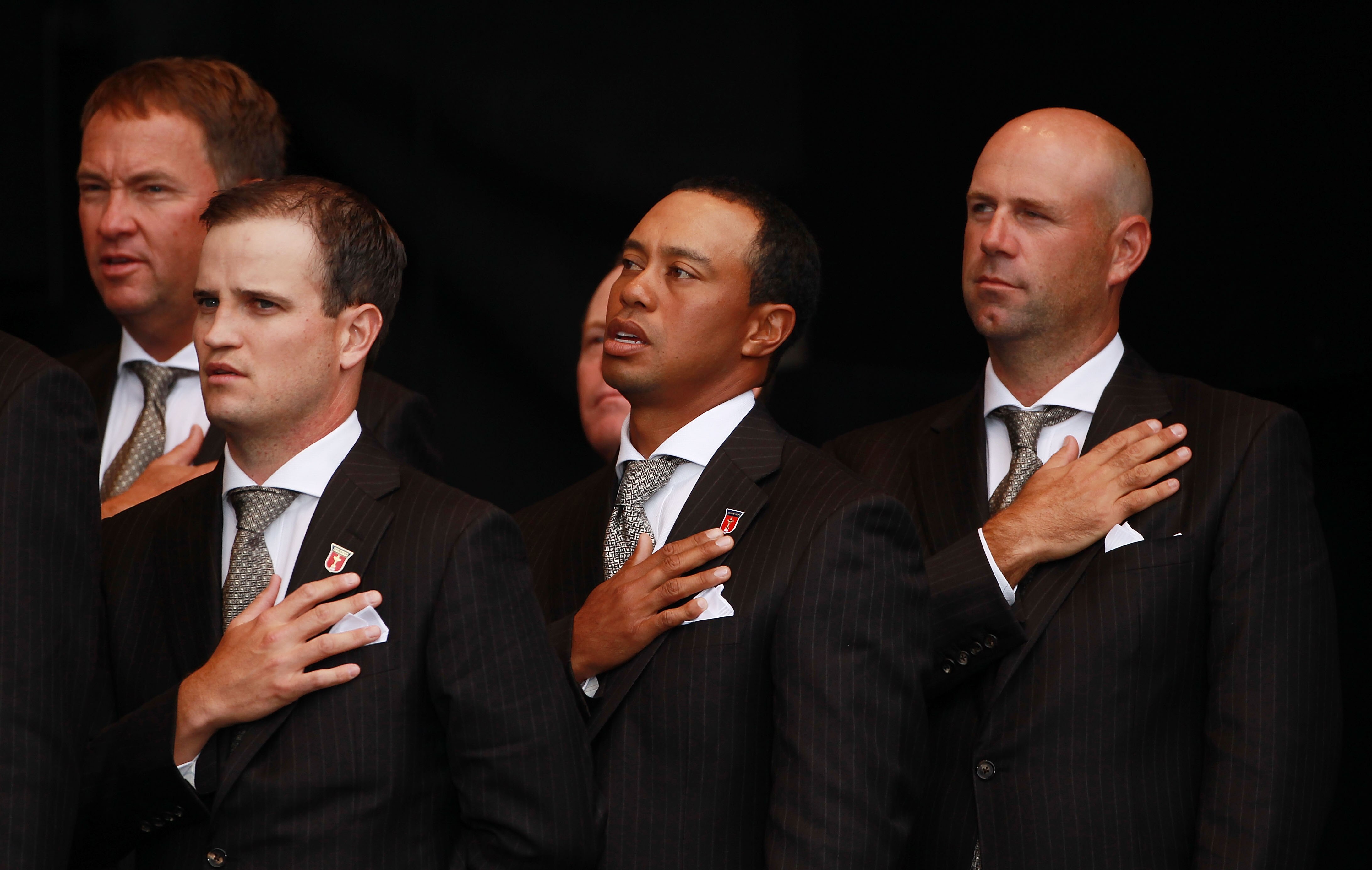 NEWPORT, WALES - SEPTEMBER 30:  Zach Johnson (L) , Tiger Woods and Stewart Cink of the USA (R) stand for their national anthem during the Opening Ceremony prior to the 2010 Ryder Cup at the Celtic Manor Resort on September 30, 2010 in Newport, Wales.  (Ph