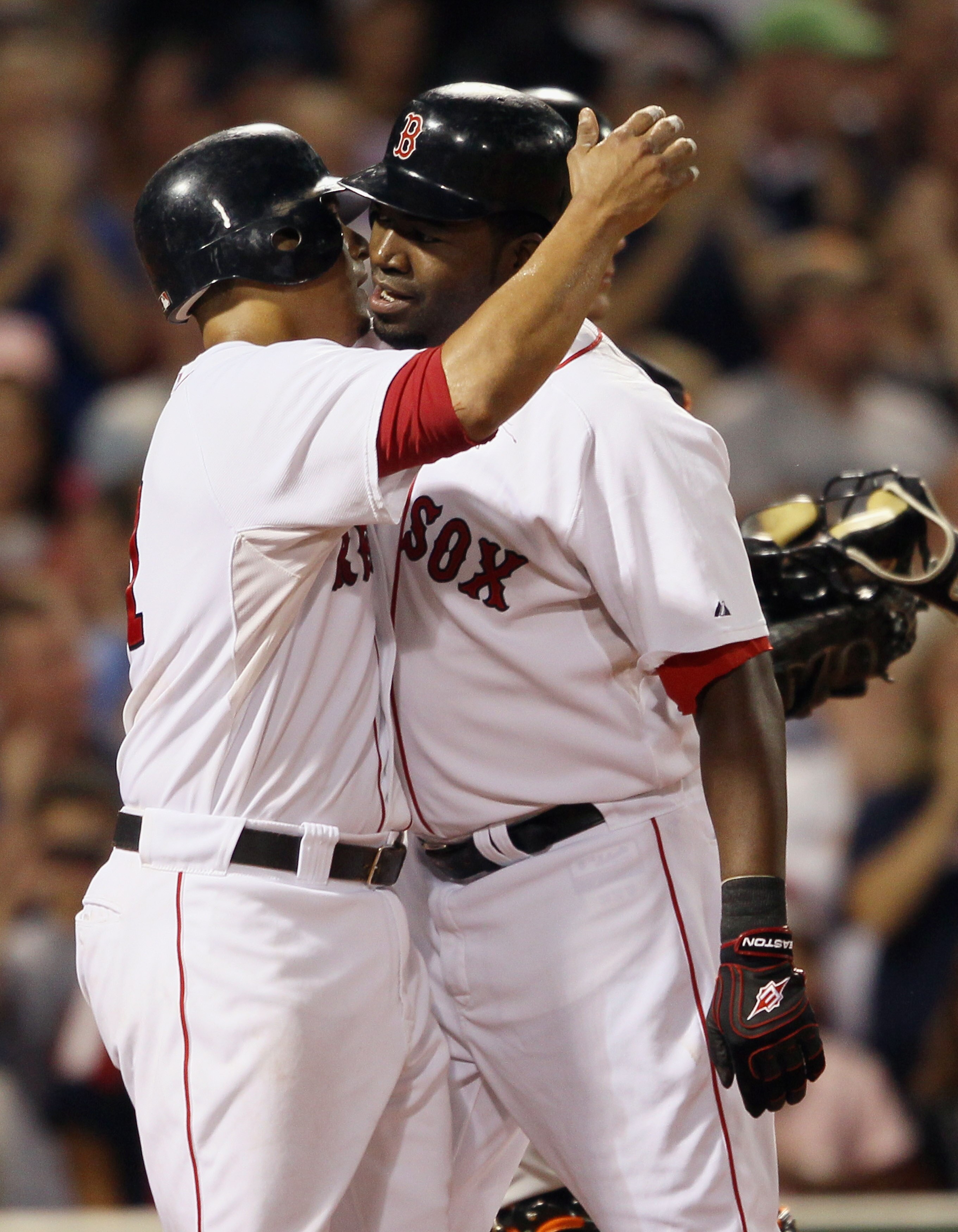 BOSTON - SEPTEMBER 22: David Ortiz #34 of the Boston Red Sox is congratulated by teammate Victor Martinez #41 after Ortiz hit a three run homer in the bottom of the fourth inning against the Baltimore Orioles on September 22, 2010 at Fenway Park in Boston
