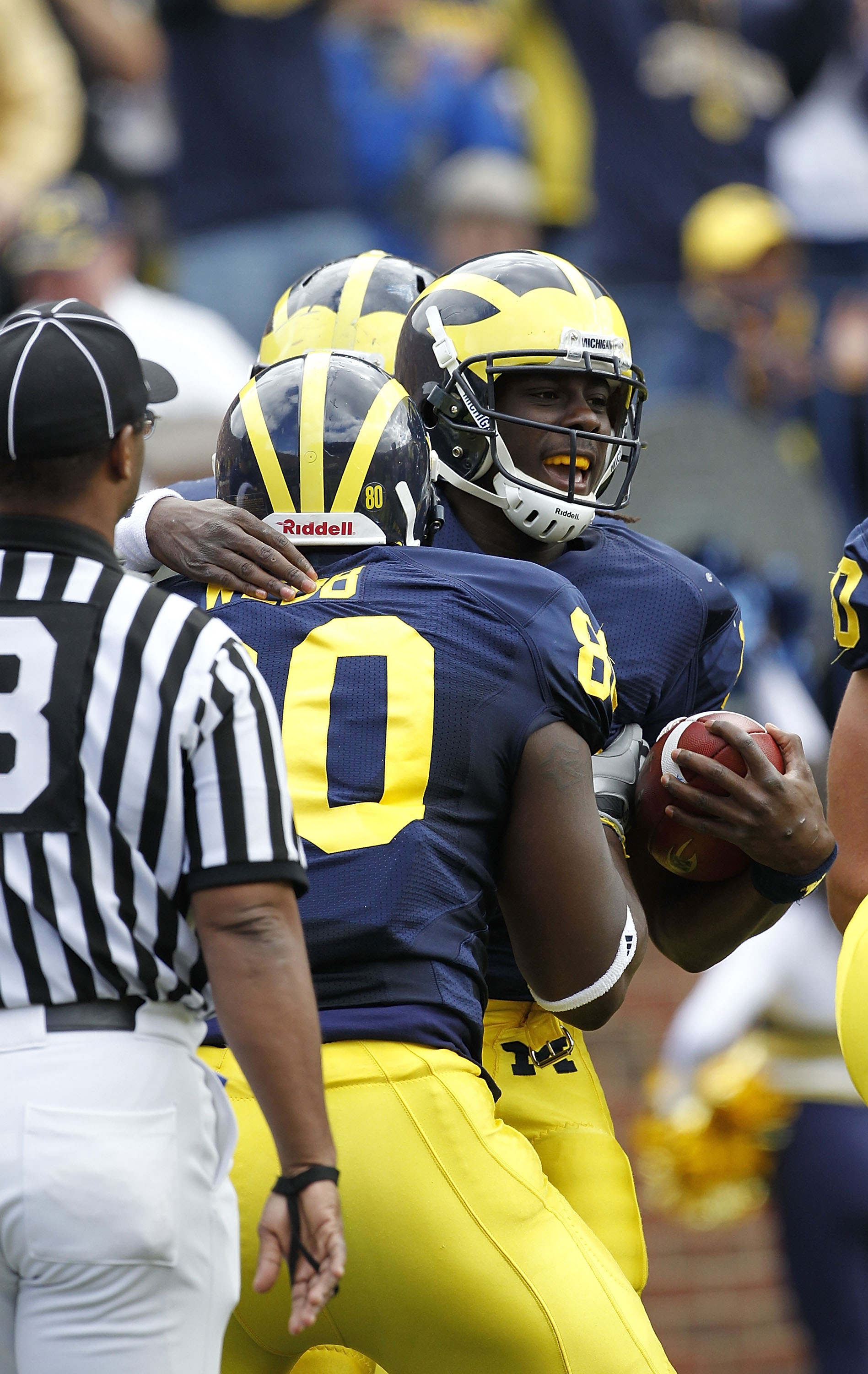 ANN ARBOR, MI - SEPTEMBER 25: Denard Robinson #16 of the Michigan Wolverines celebrates a first quarter touchdown during the game against Bowling Green on September 25, 2010 at Michigan Stadium in Ann Arbor, Michigan. Michigan defeated Bowling Green 65-21