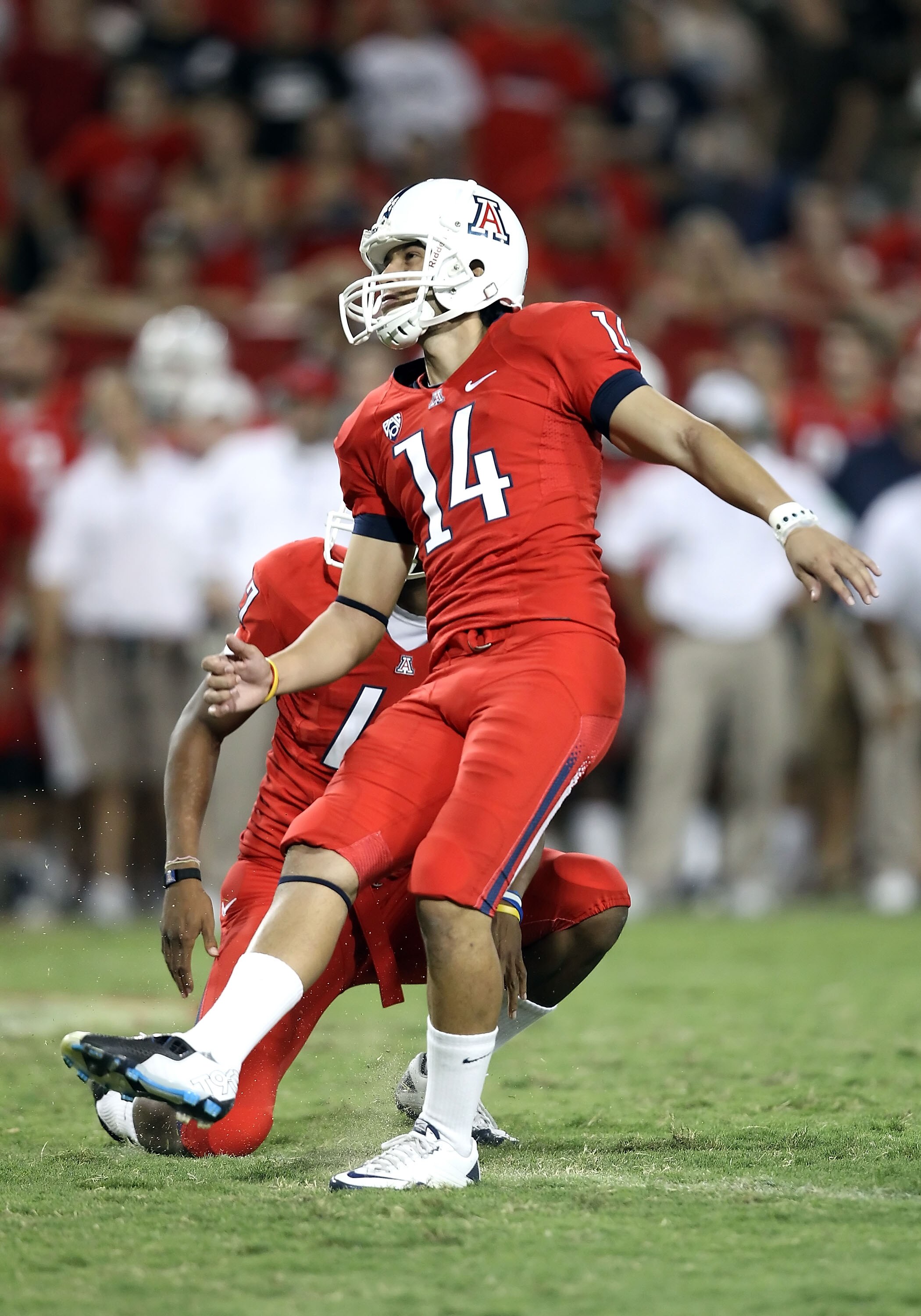 TUCSON, AZ - SEPTEMBER 25:  Kicker Alex Zendejas #14 of the Arizona Wildcats attempts a field goal during the college football game against the California Golden Bears at Arizona Stadium on September 25, 2010 in Tucson, Arizona.   The Wildcats defeated th