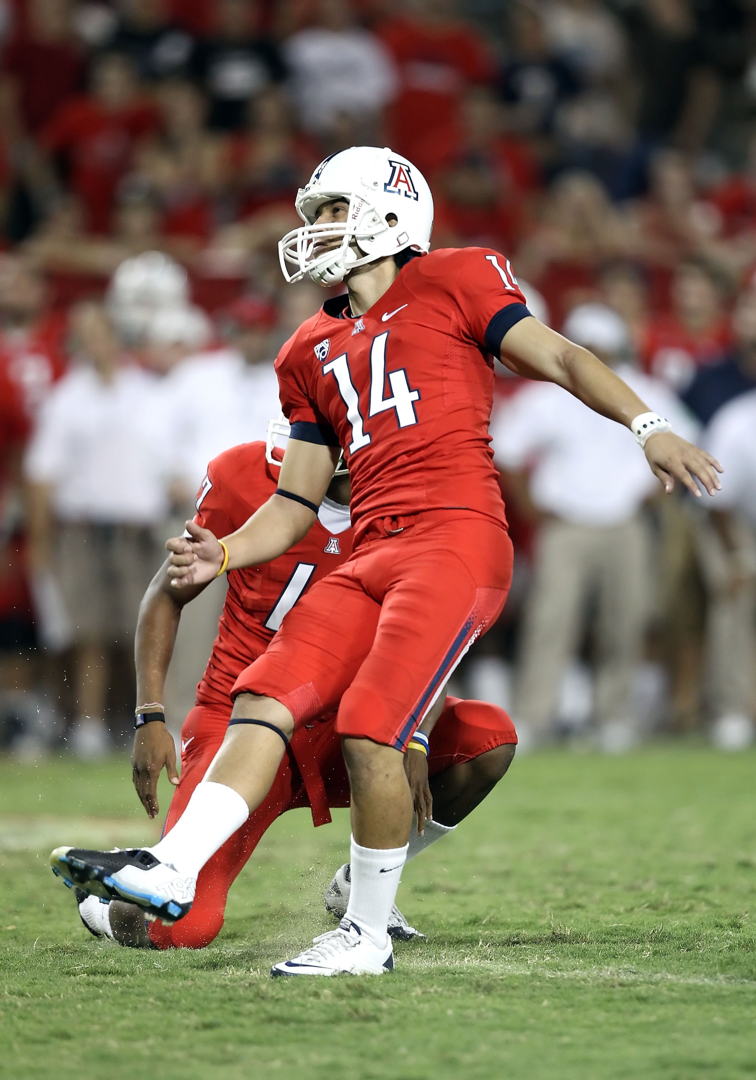TUCSON, AZ - SEPTEMBER 25:  Kicker Alex Zendejas #14 of the Arizona Wildcats attempts a field goal during the college football game against the California Golden Bears at Arizona Stadium on September 25, 2010 in Tucson, Arizona.   The Wildcats defeated th