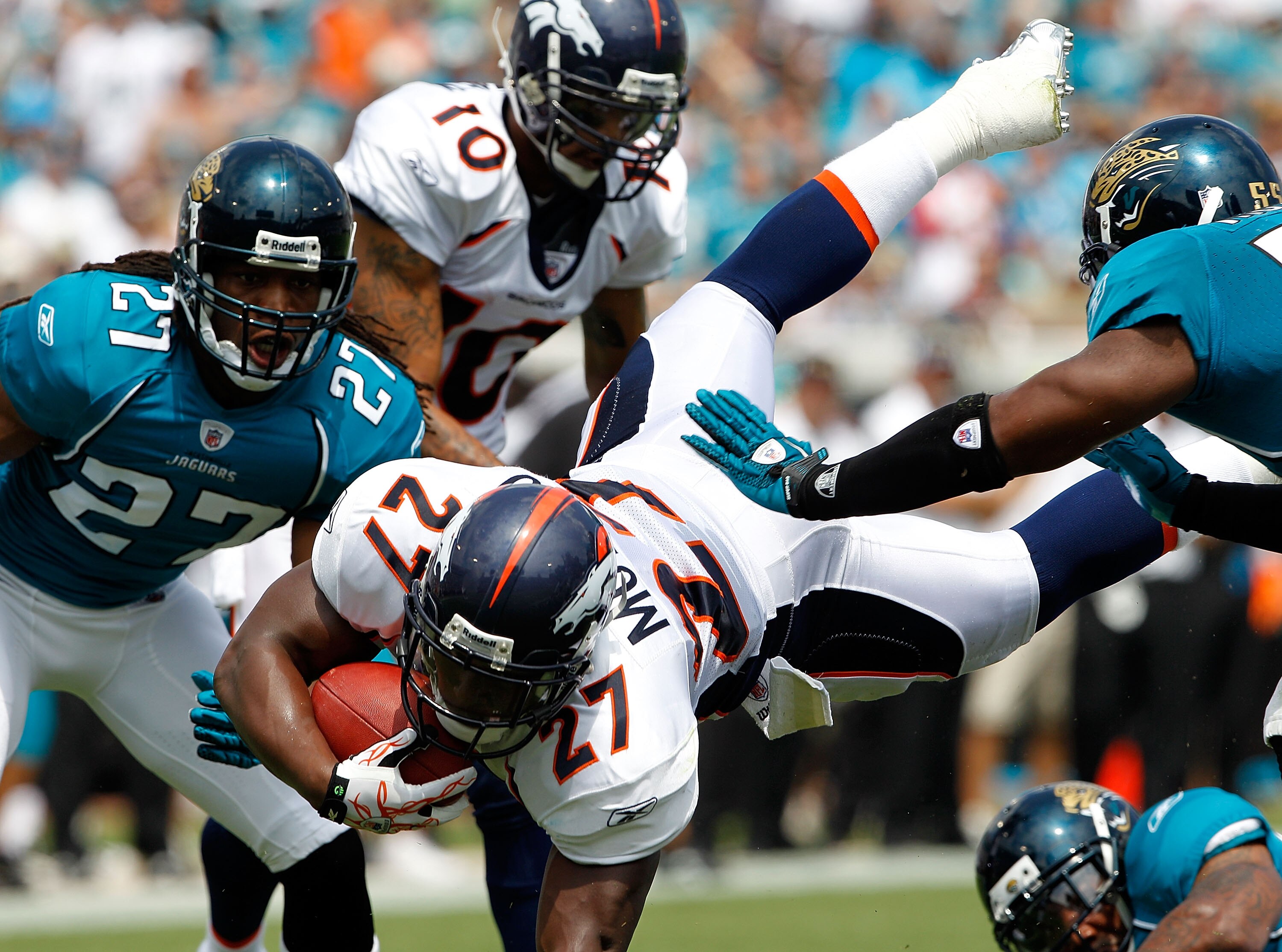 JACKSONVILLE, FL - SEPTEMBER 12:  Knowshon Moreno #27 of the Denver Broncos dives for a firstdown during the NFL season opener game against the Jacksonville Jaguars at EverBank Field on September 12, 2010 in Jacksonville, Florida.  (Photo by Sam Greenwood