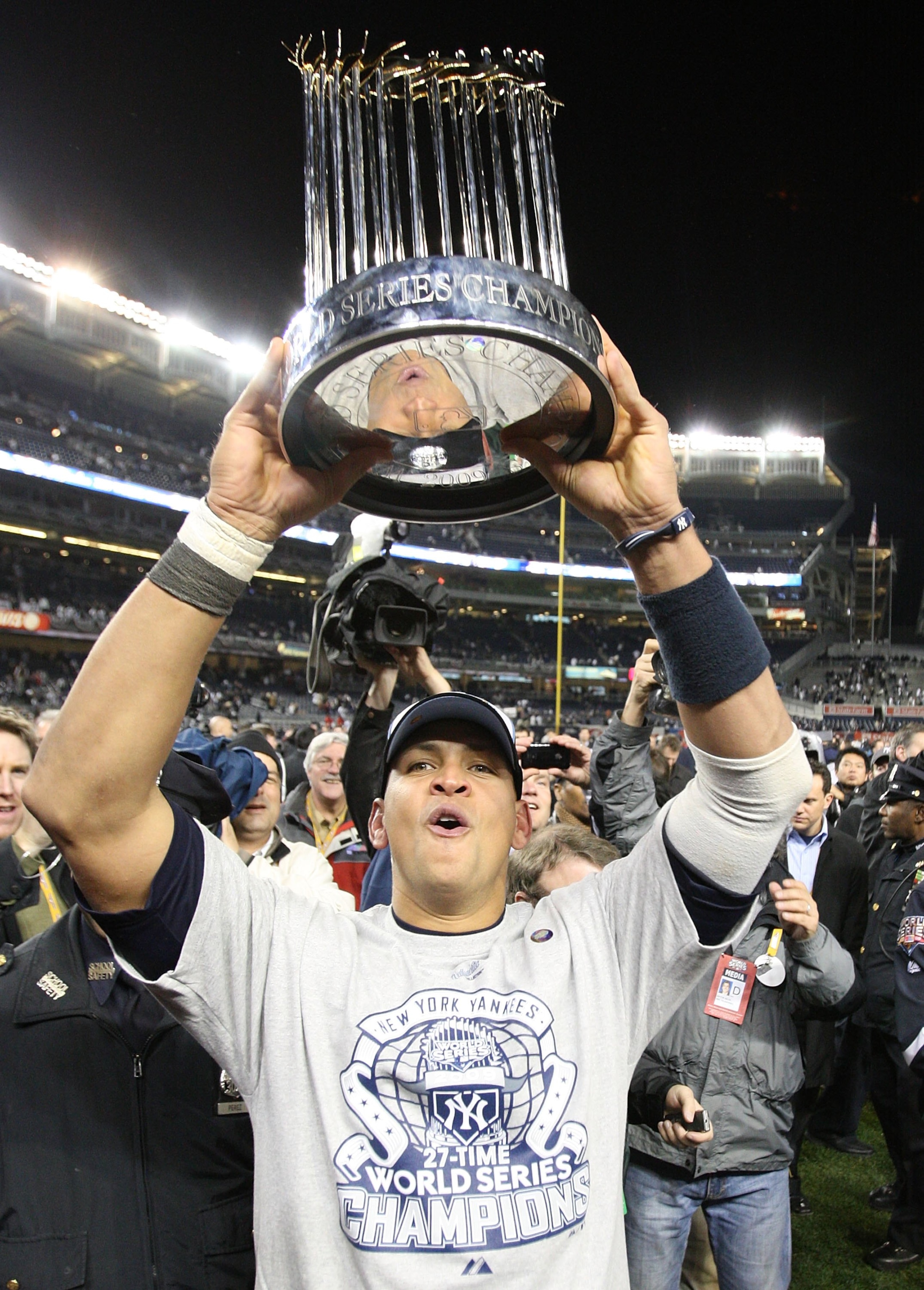 NEW YORK - NOVEMBER 04:  Alex Rodriguez #13 of the New York Yankees celebrates with the World Series trophy after their 7-3 win against the Philadelphia Phillies in Game Six of the 2009 MLB World Series at Yankee Stadium on November 4, 2009 in the Bronx b