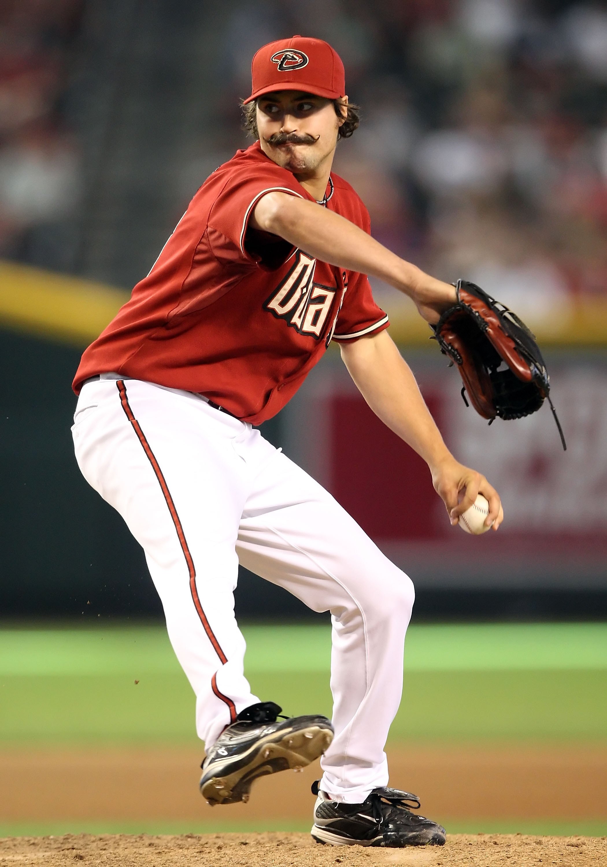 PHOENIX - JUNE 28:  Relief pitcher Clay Zavada #35 of the Arizona Diamondbacks pitches against the Los Angeles Angels of Anaheim during the major league baseball game at Chase Field on June 28, 2009 in Phoenix, Arizona. The Angels defeated the Diamondback