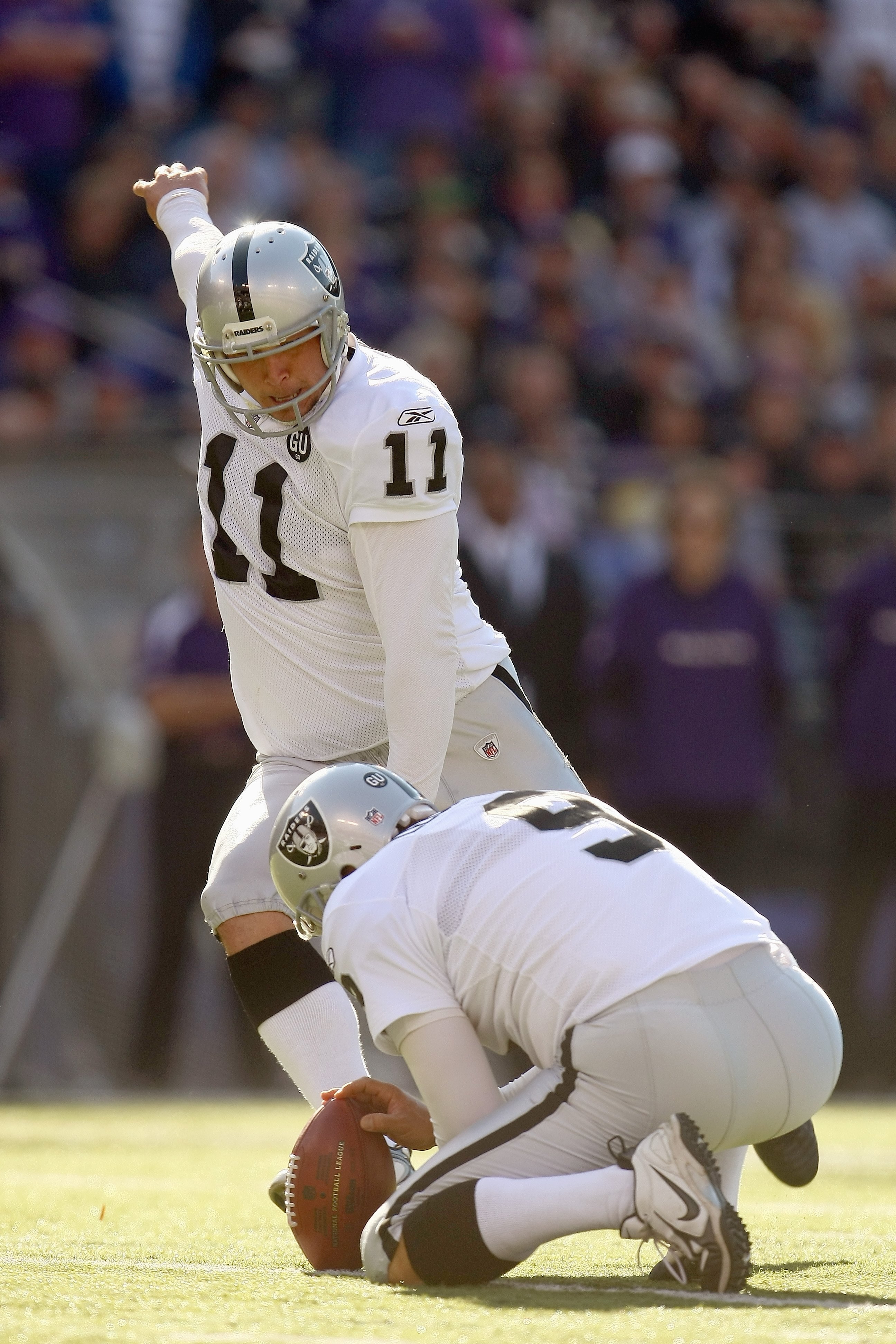 BALTIMORE - OCTOBER 26:  Sebastian Janokowski #11 of the Oakland Raiders kicks a field goal during the game against the Baltimore Raven at M&T Bank Stadium on October 26, 2008 in Baltimore, Maryland. (Photo by: Chris McGrath/Getty Images)