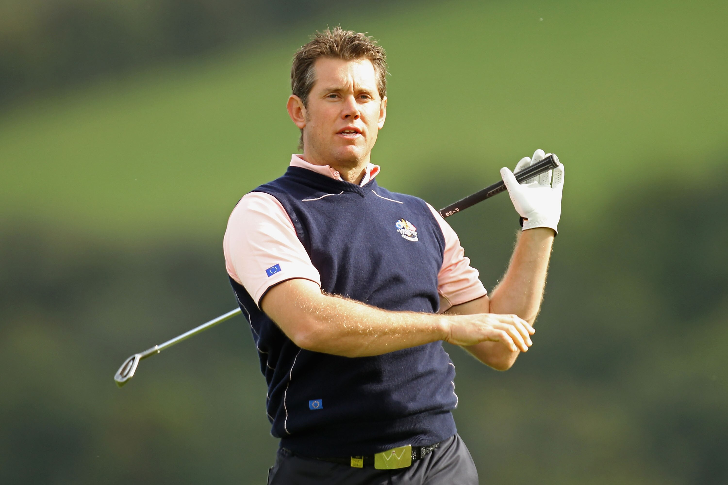NEWPORT, WALES - SEPTEMBER 30:  Lee Westwood of Europe watches a shot during a practice round prior to the 2010 Ryder Cup at the Celtic Manor Resort on September 30, 2010 in Newport, Wales.  (Photo by Ross Kinnaird/Getty Images)