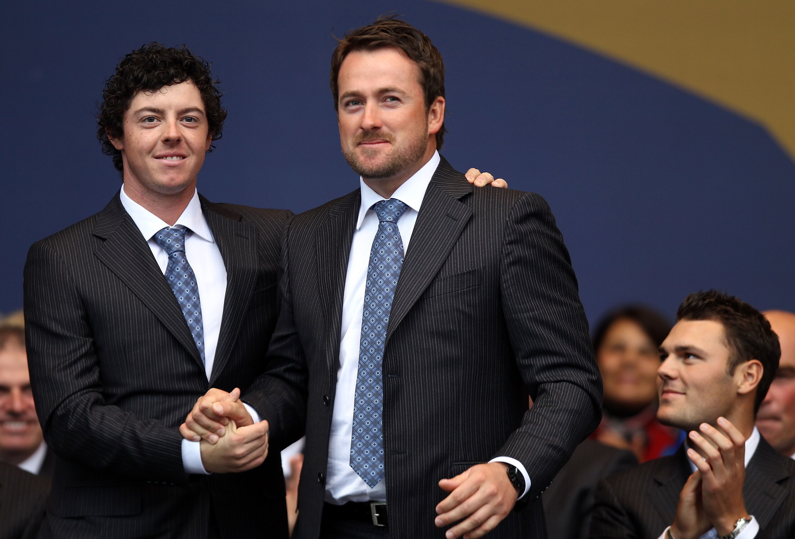 NEWPORT, WALES - SEPTEMBER 30:  Rory McIlroy (L) and Graeme McDowell of Europe stand together during the Opening Ceremony prior to the 2010 Ryder Cup at the Celtic Manor Resort on September 30, 2010 in Newport, Wales.  (Photo by Ross Kinnaird/Getty Images